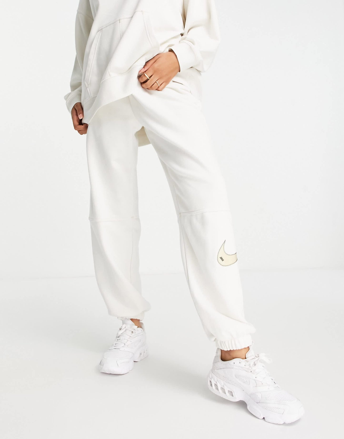 Nike Swoosh fleece joggers in phantom white