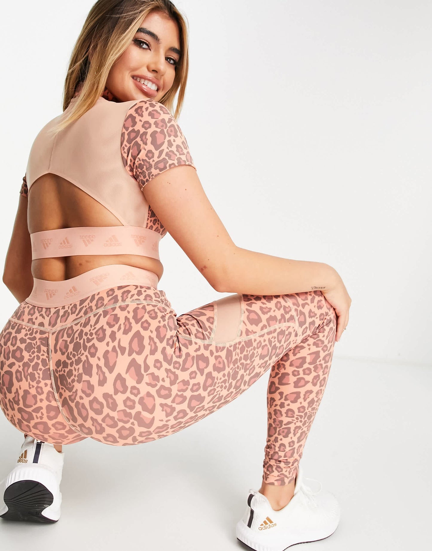 adidas Training cropped zip t-shirt in orange leopard print