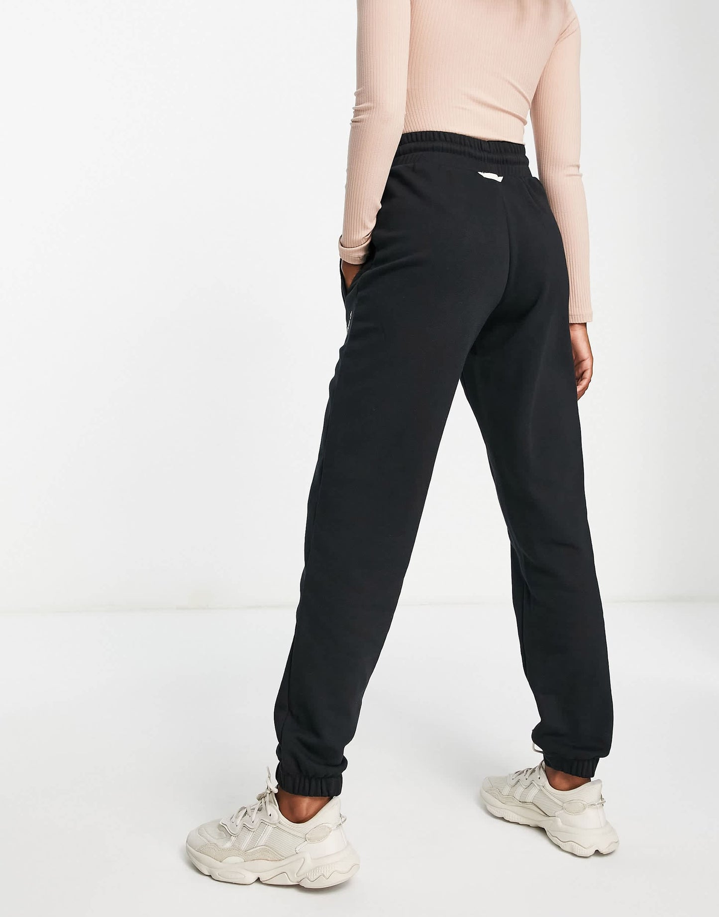 adidas Originals 'Logomania' triple logo joggers in black