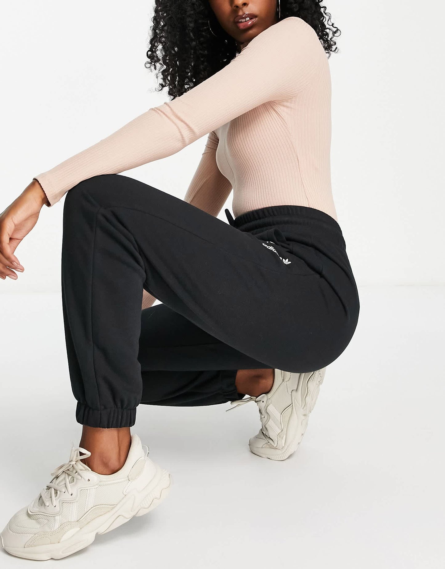 adidas Originals 'Logomania' triple logo joggers in black