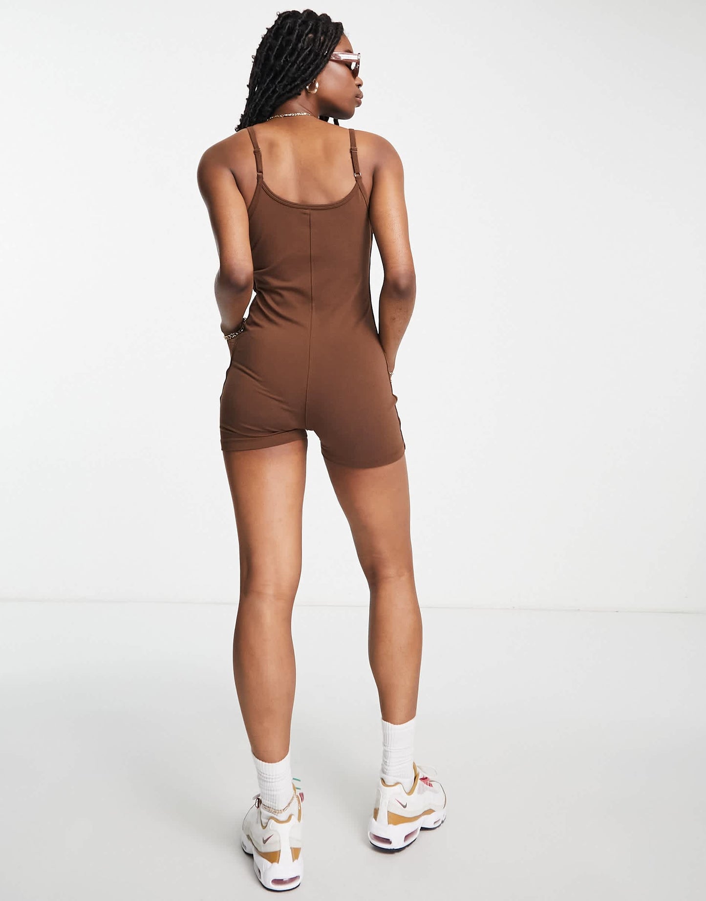 Nike swoosh tape unitard in cacao brown