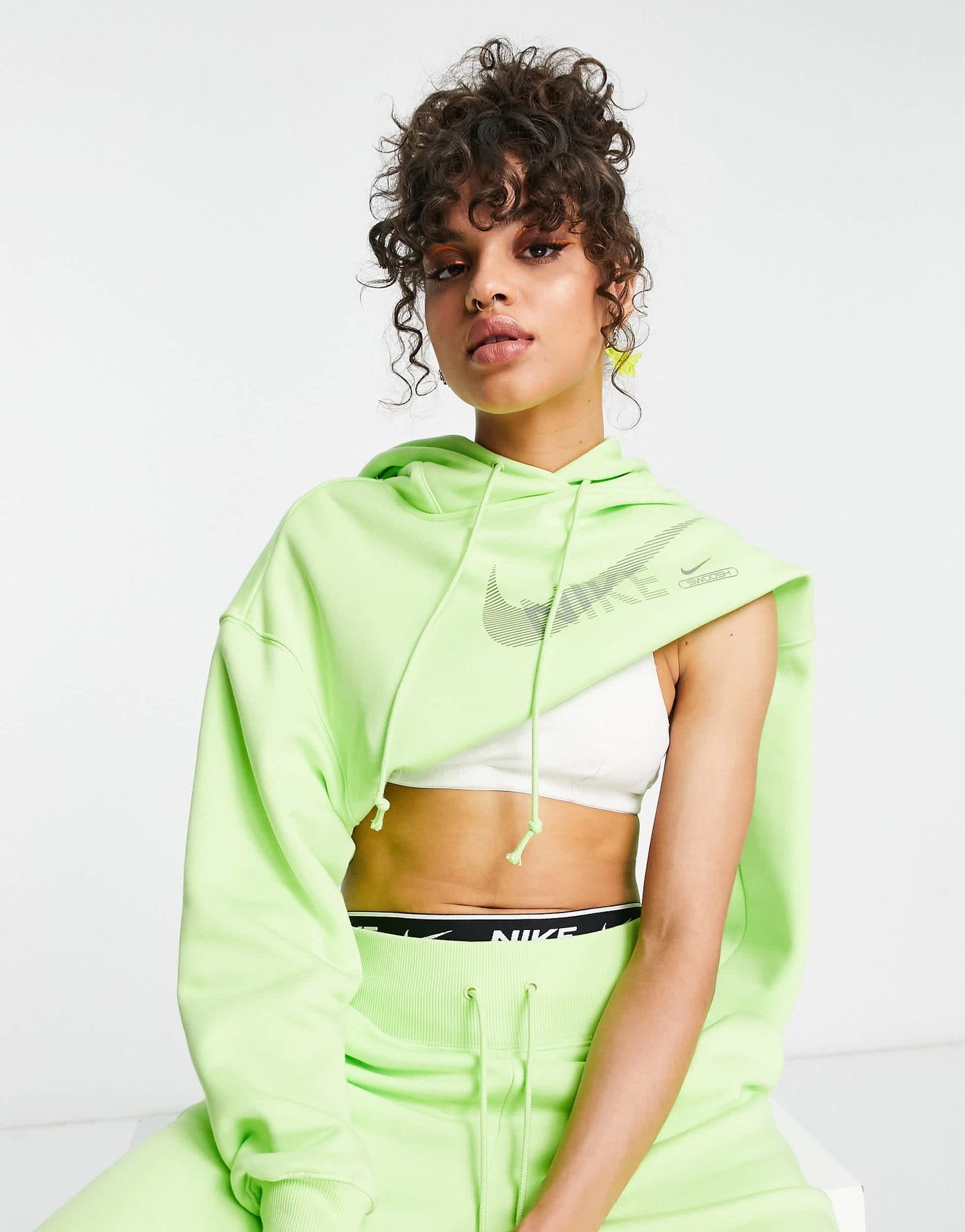 Nike Swoosh graphic cropped pullover hoodie in lime green
