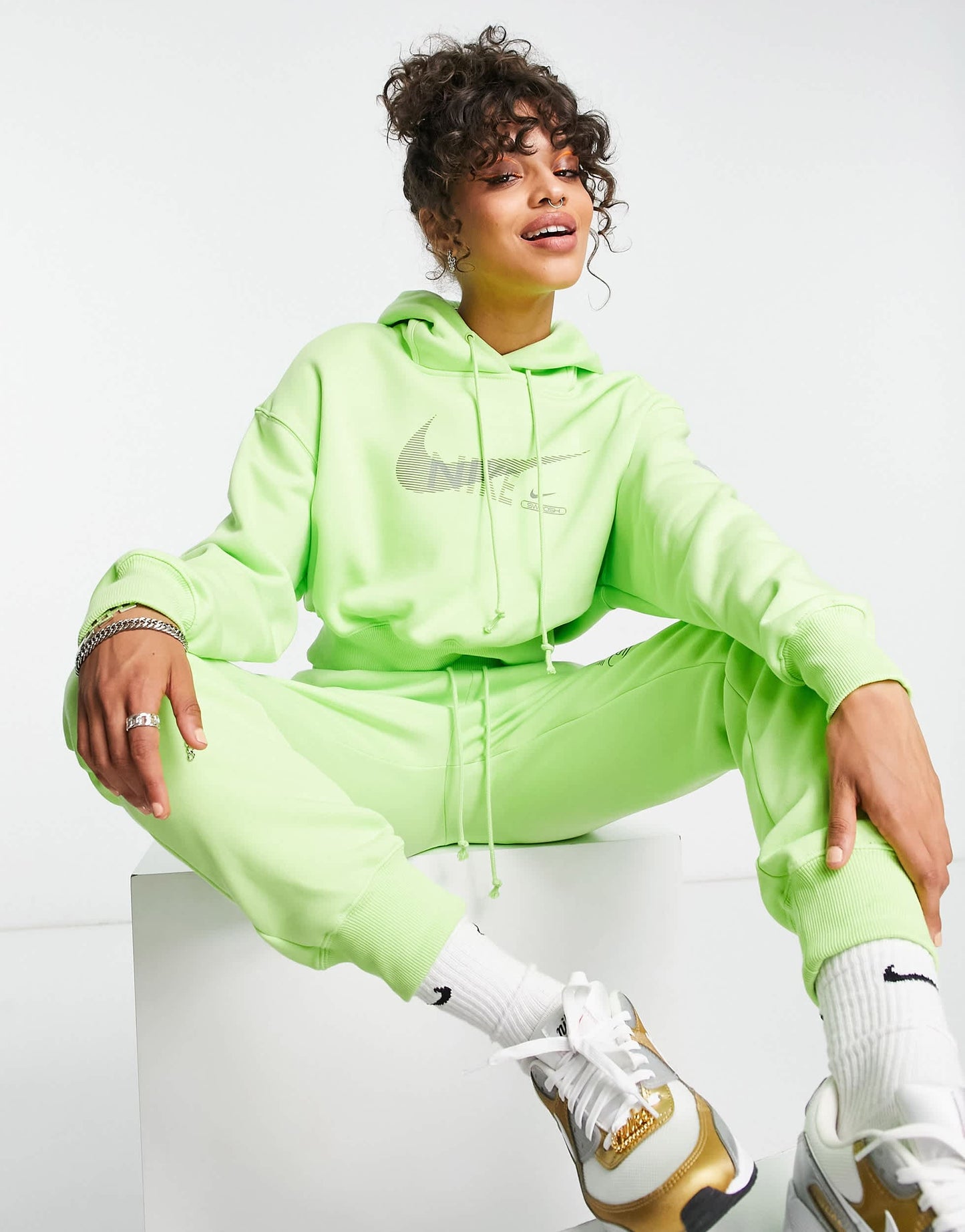 Nike Swoosh graphic cropped pullover hoodie in lime green