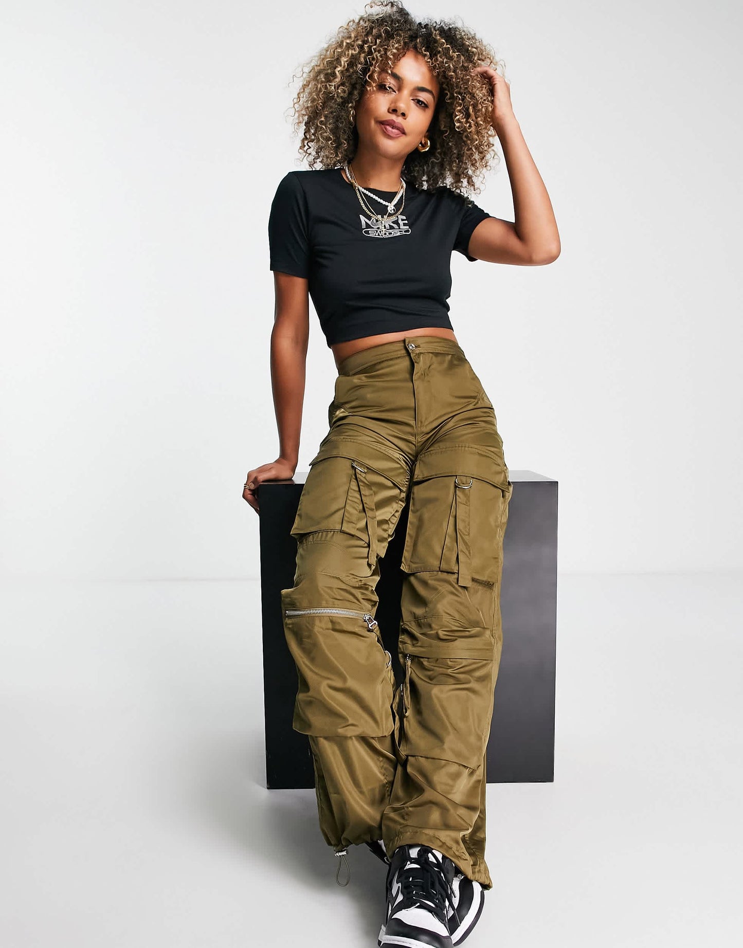 Nike Swoosh graphic slim crop t-shirt in black