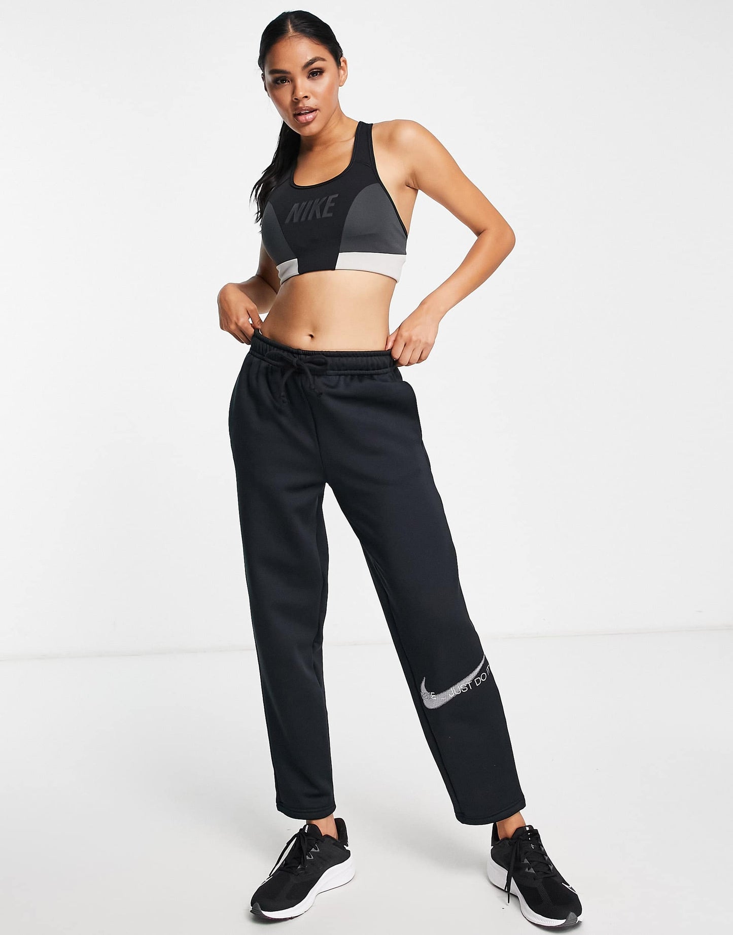 Nike One Training colourblock logo medium support sports bra in black