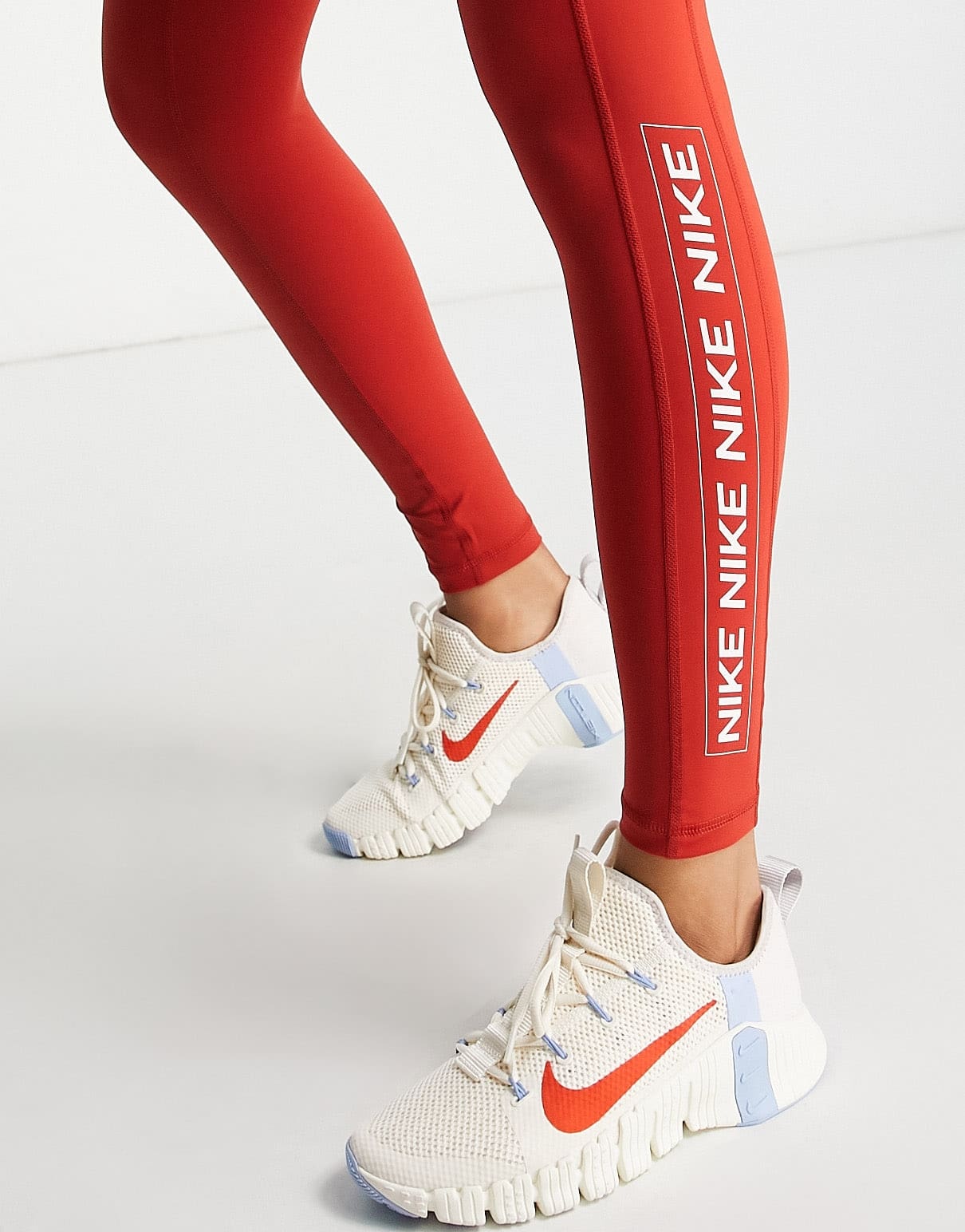 Nike Pro Training Dri-FIT graphic mid rise leggings in red