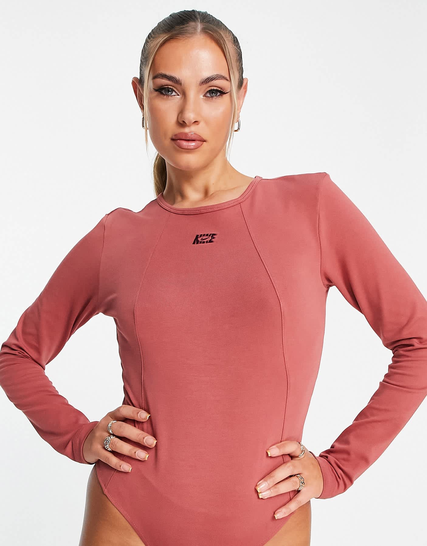 Nike Icon Clash badge logo body in canyon rust