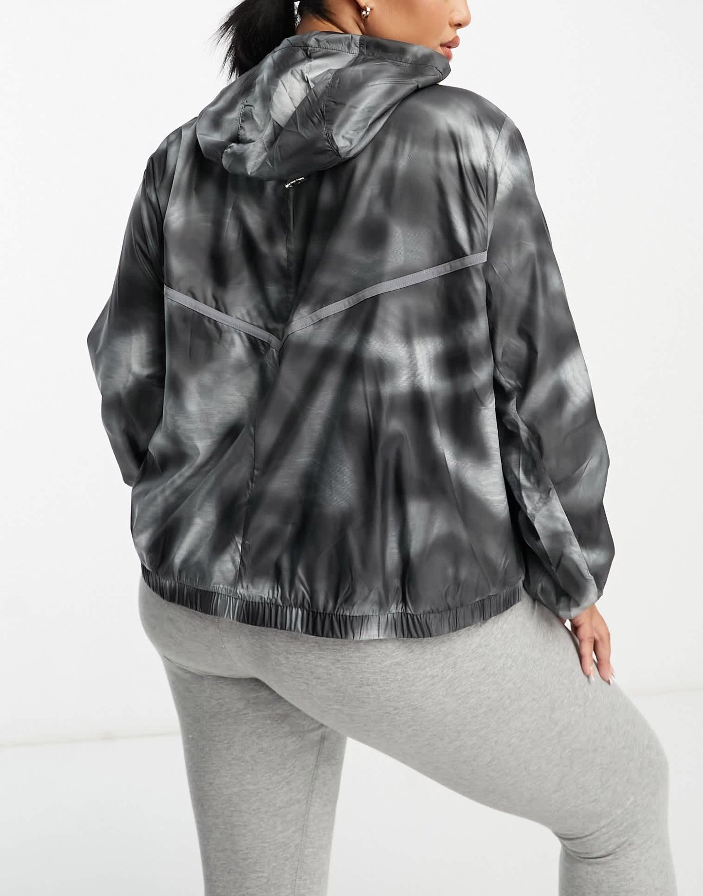 Nike Running Icon Clash Plus Repel woven all over print jacket in black