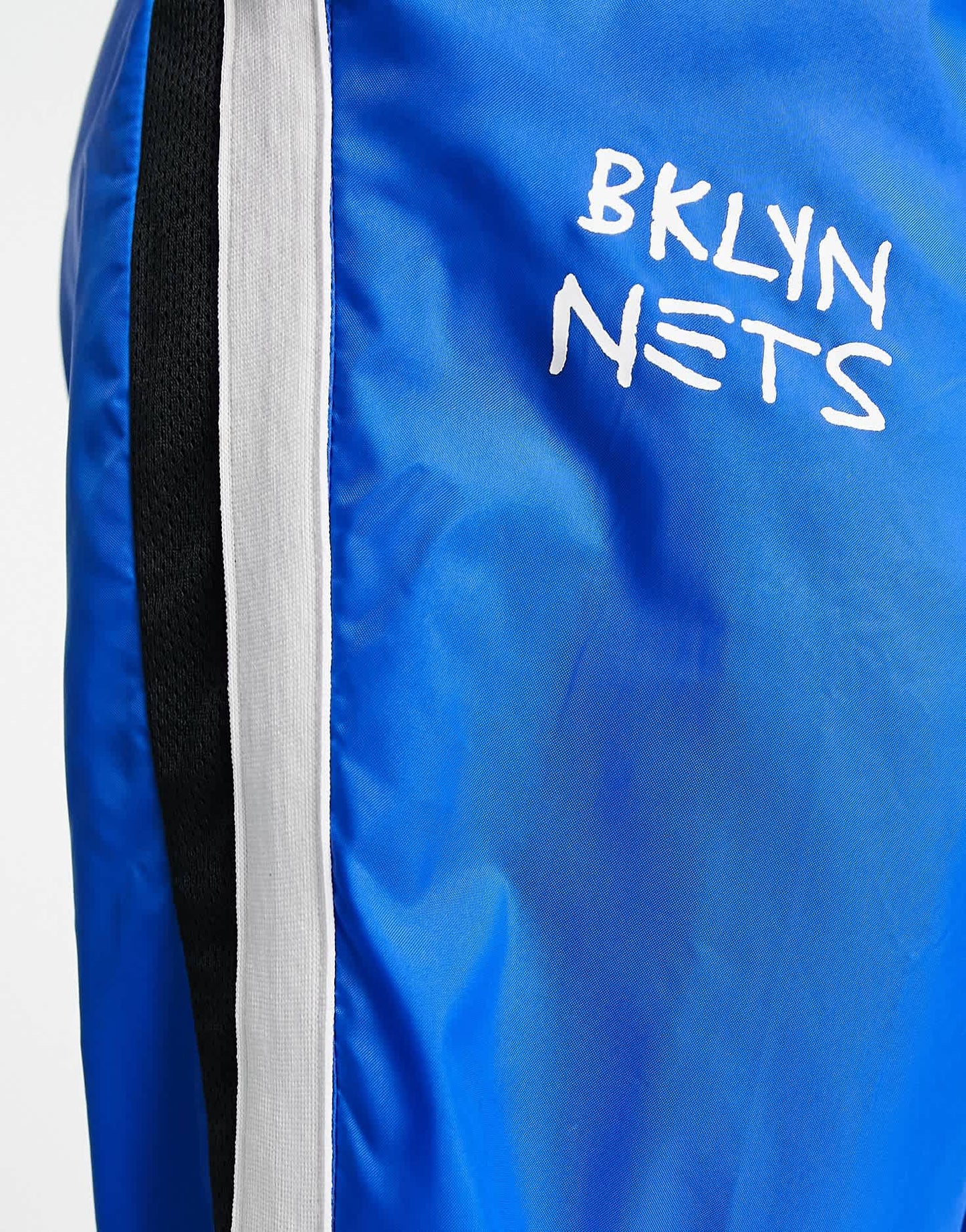 Nike Basketball NBA Brooklyn Nets tracksuit joggerss in blue