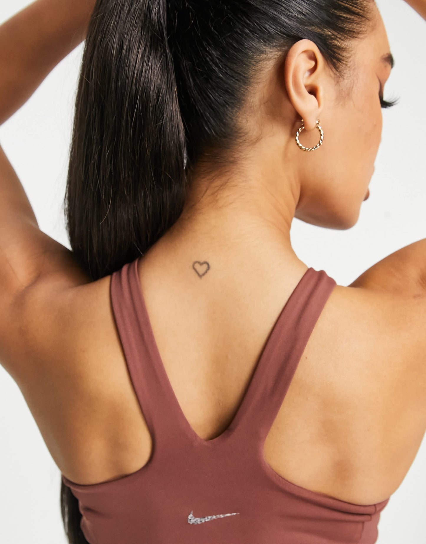 Nike Yoga Luxe Dri-FIT cropped top in brown