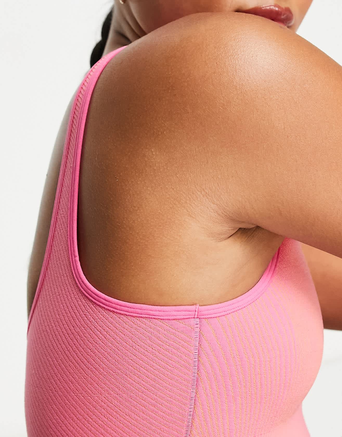 Nike Yoga Dri-FIT ADV Indy seamless light support sports bra in pink