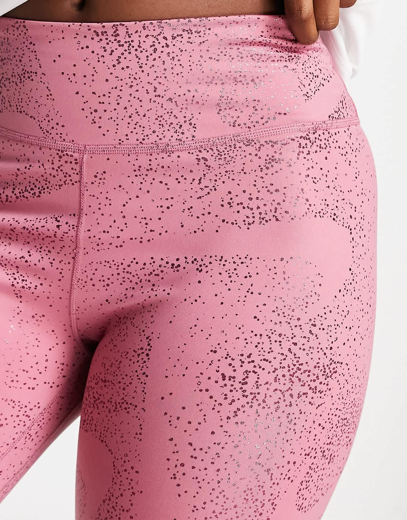 Nike One Training Dri-FIT glitter printed mid rise leggings in pink