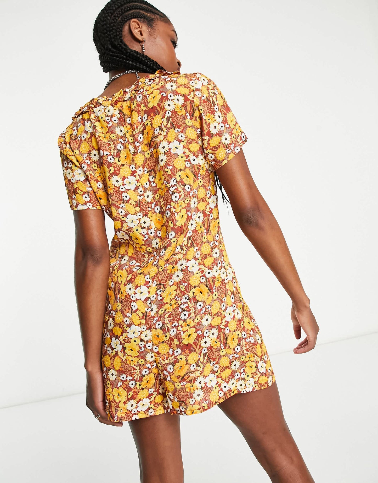 Reclaimed Vintage short sleeve playsuit with ruffle trim in vintage brown floral