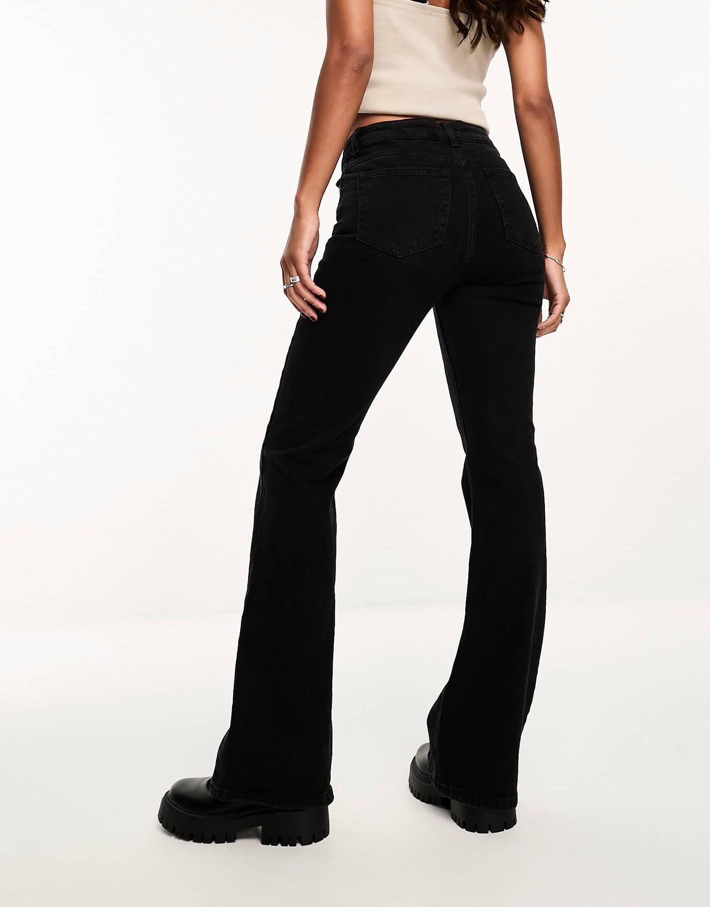 ASOS DESIGN mid rise flare jeans in washed black