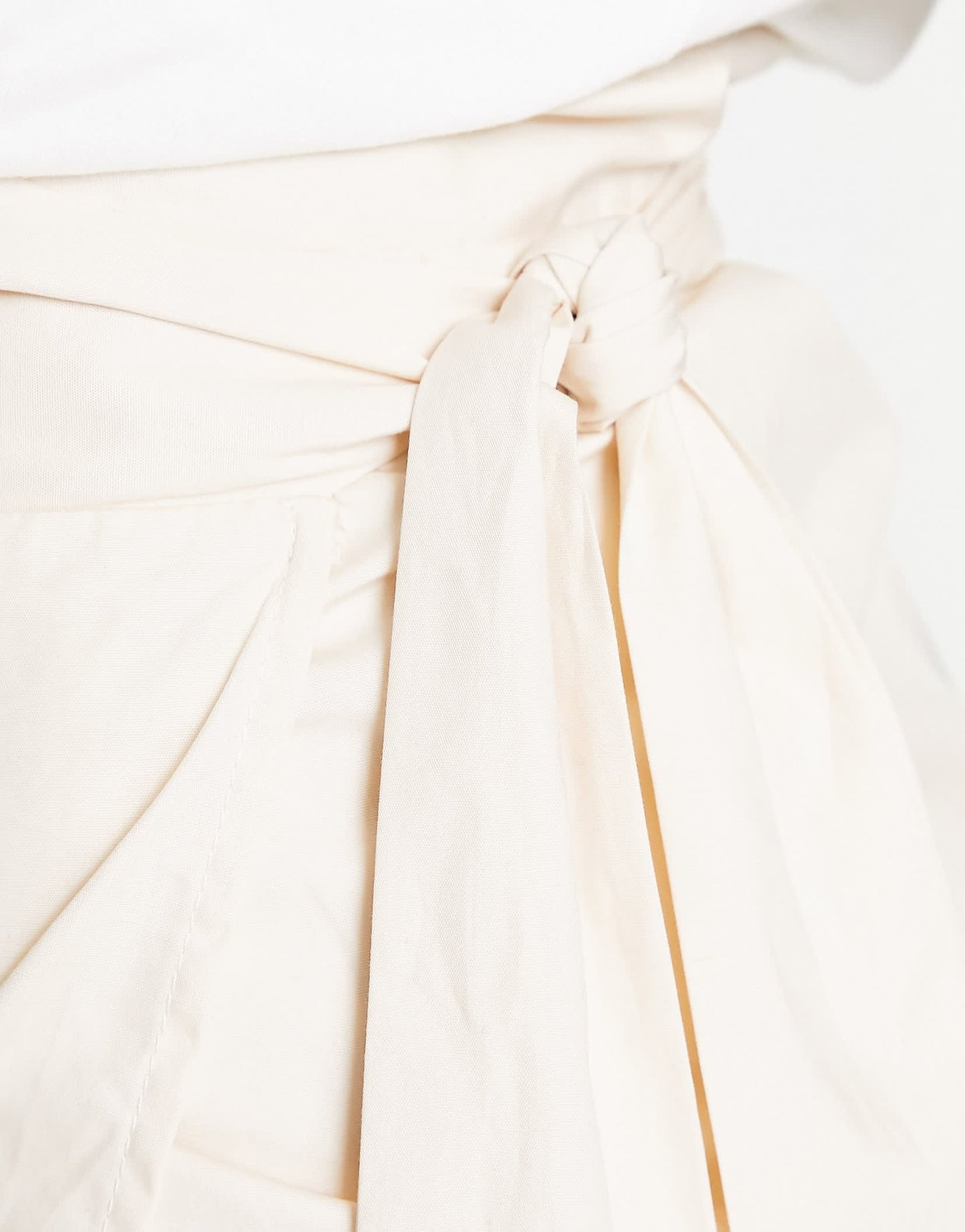 Amy Lynn wrap mini skirt in cream