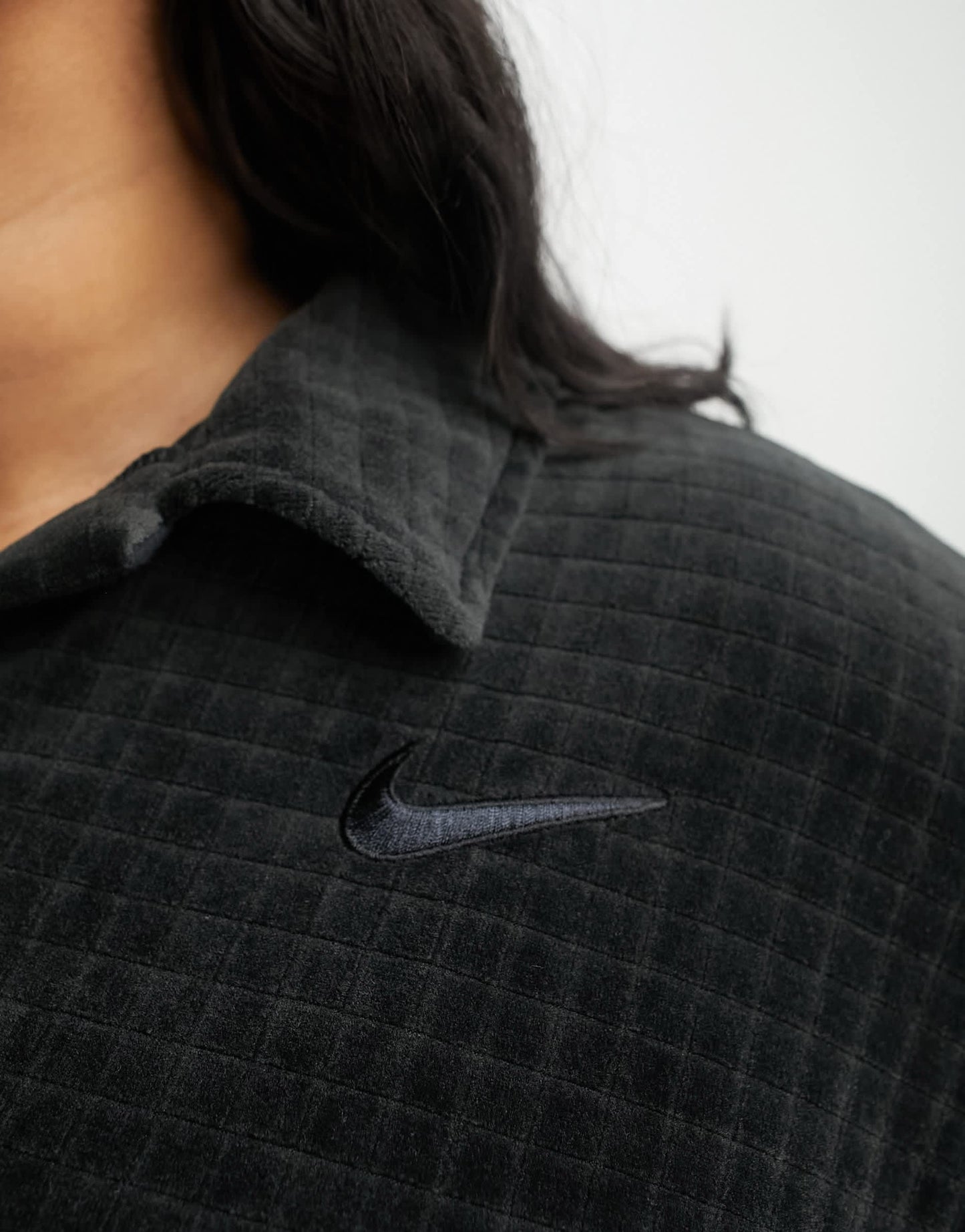 Nike Plus velour cropped polo shirt in black