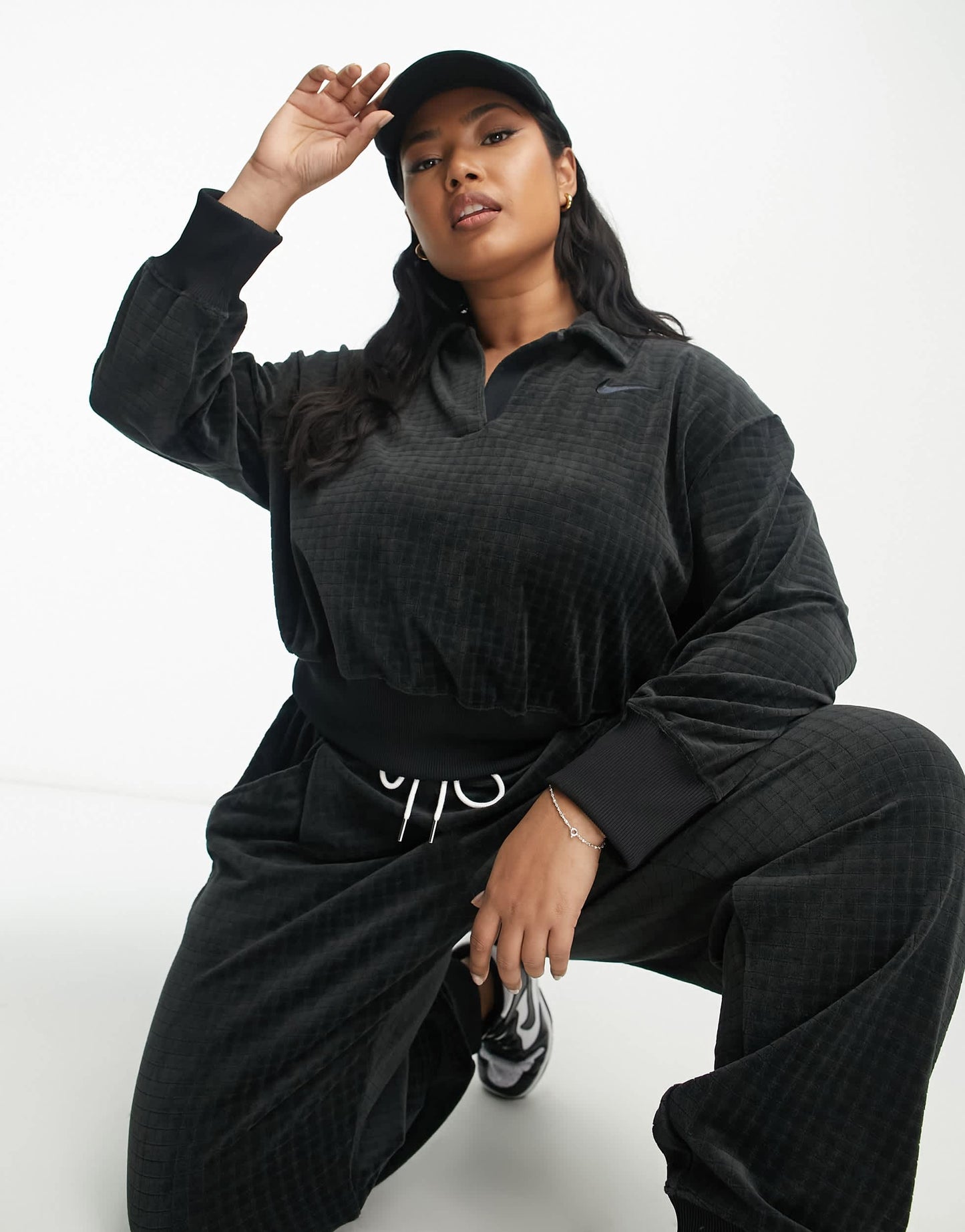 Nike Plus velour cropped polo shirt in black