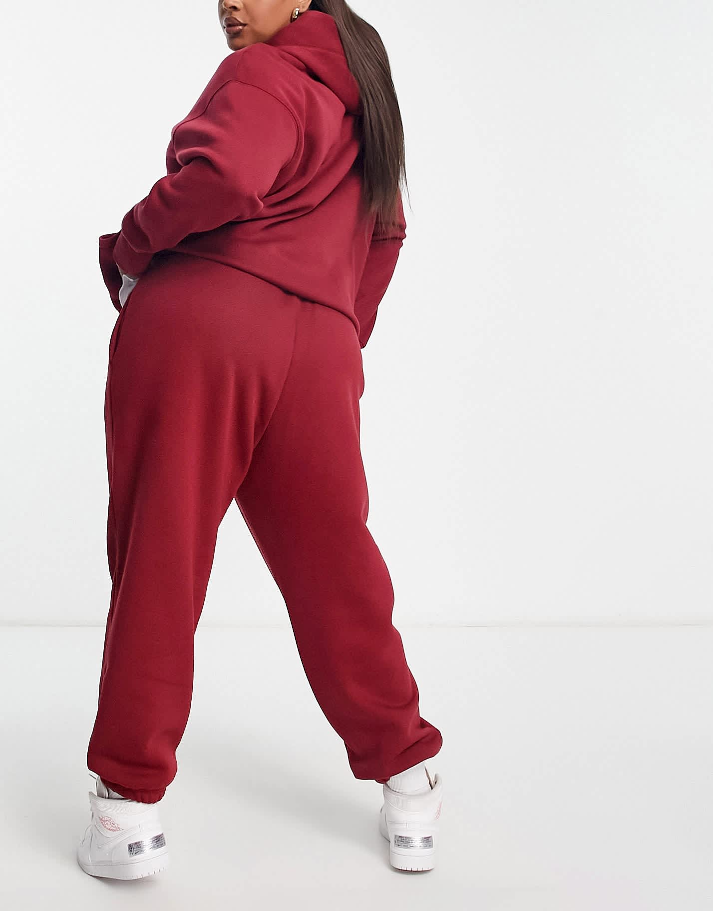 Nike Plus Phoenix joggers in team red