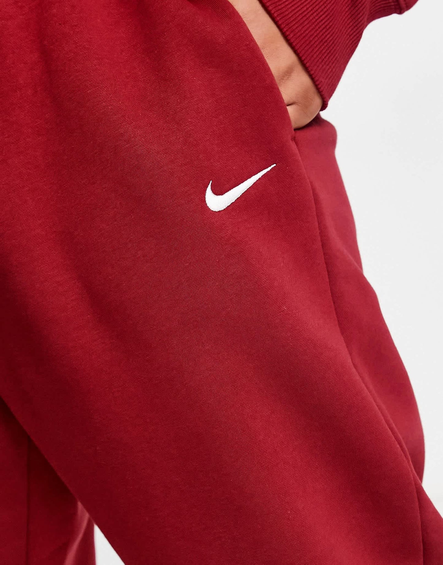 Nike Plus Phoenix joggers in team red