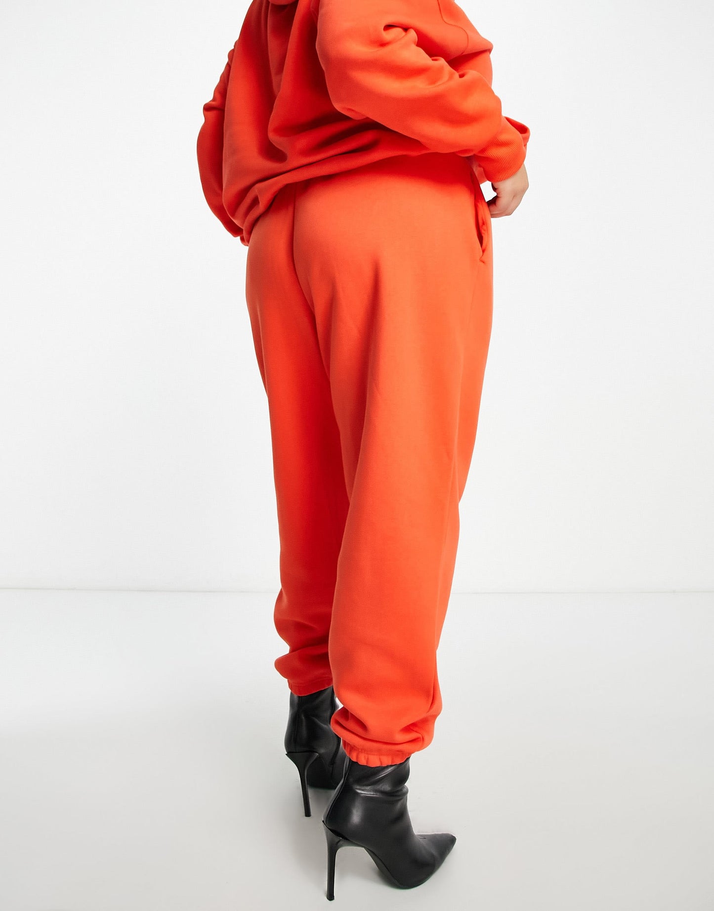 Nike Plus Phoenix joggers in red