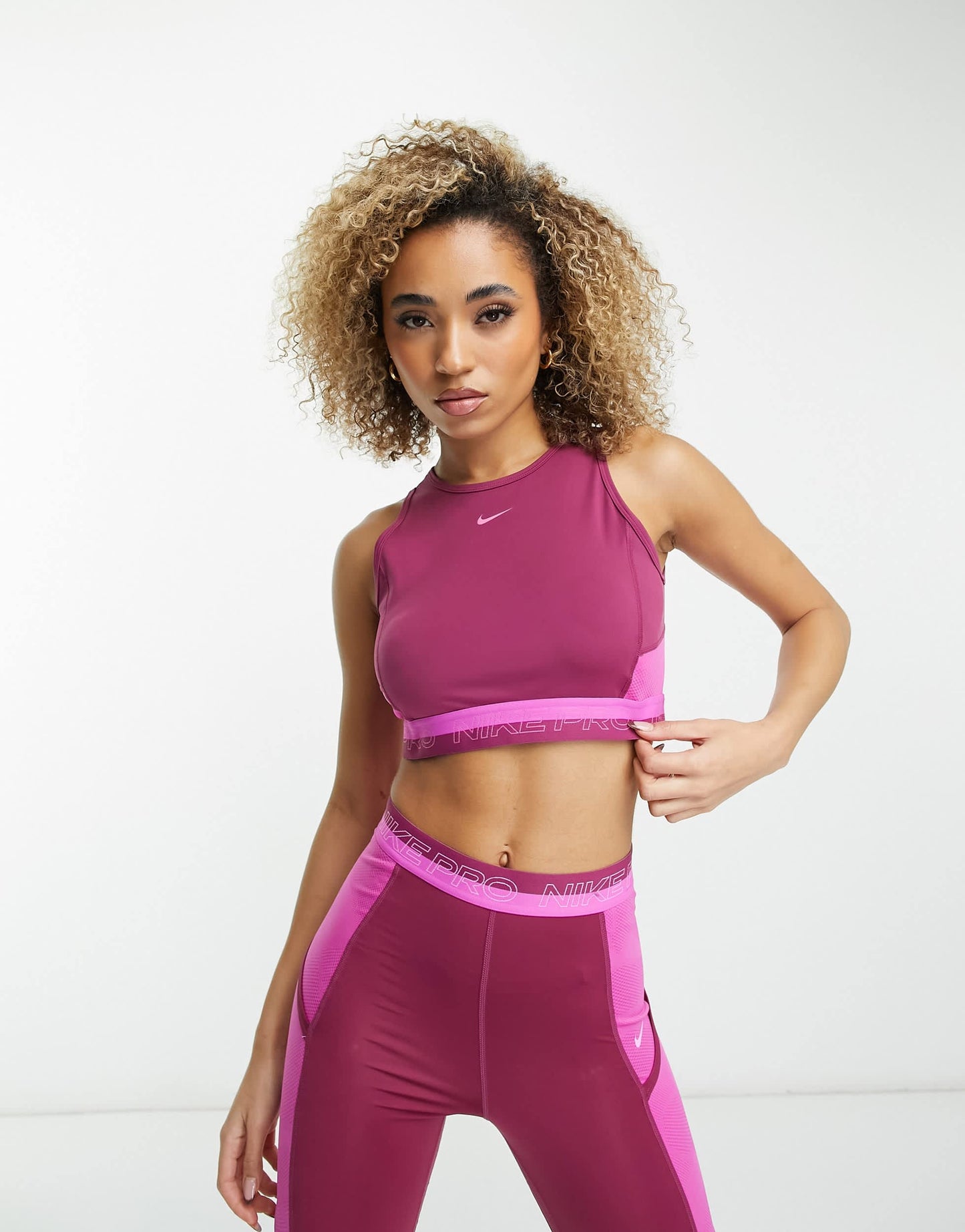 Nike Pro Femme Training Dri-FIT cropped tank top in purple