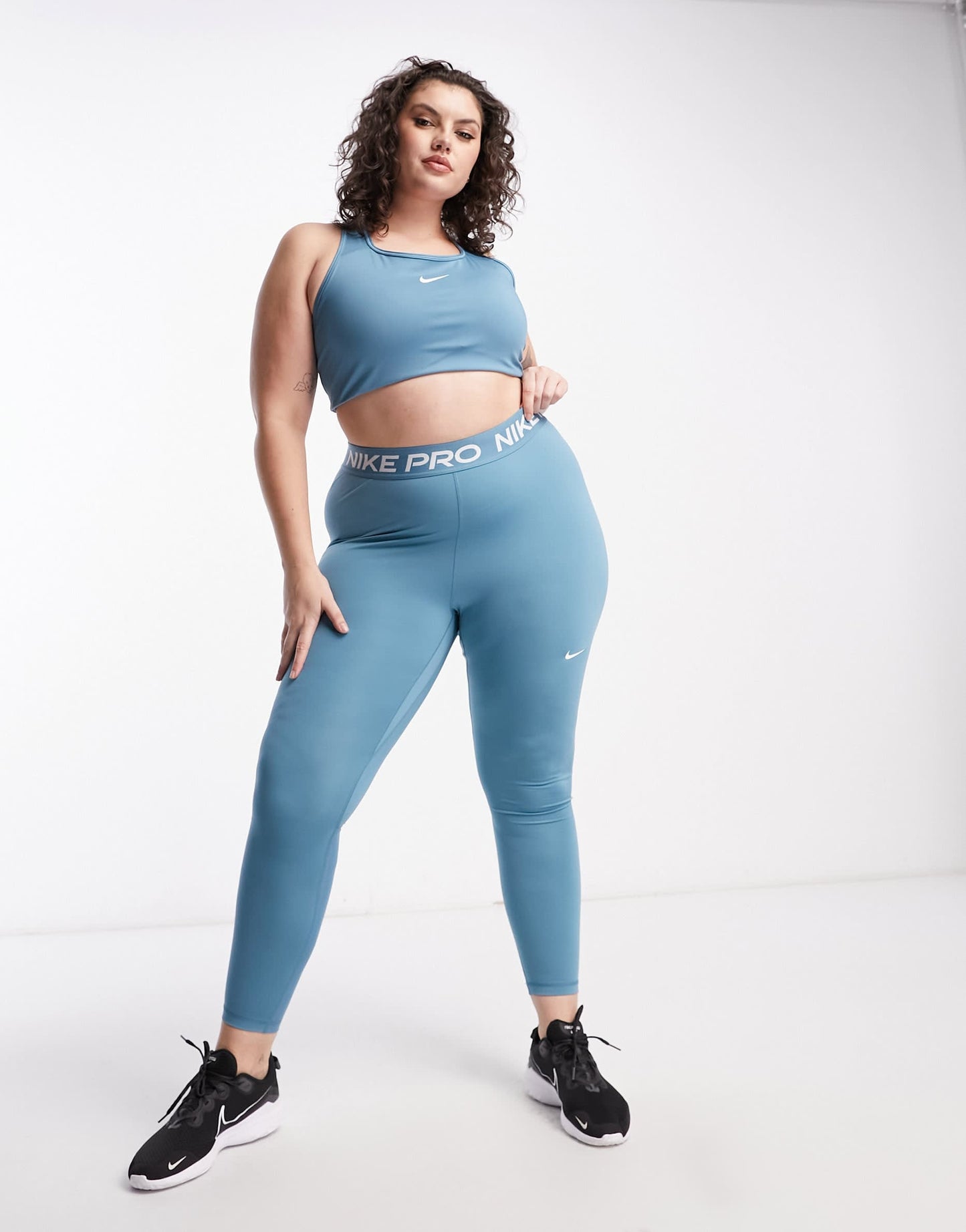 Nike Training Swoosh Plus Dri-FIT padded medium support sports bra in aqua blue