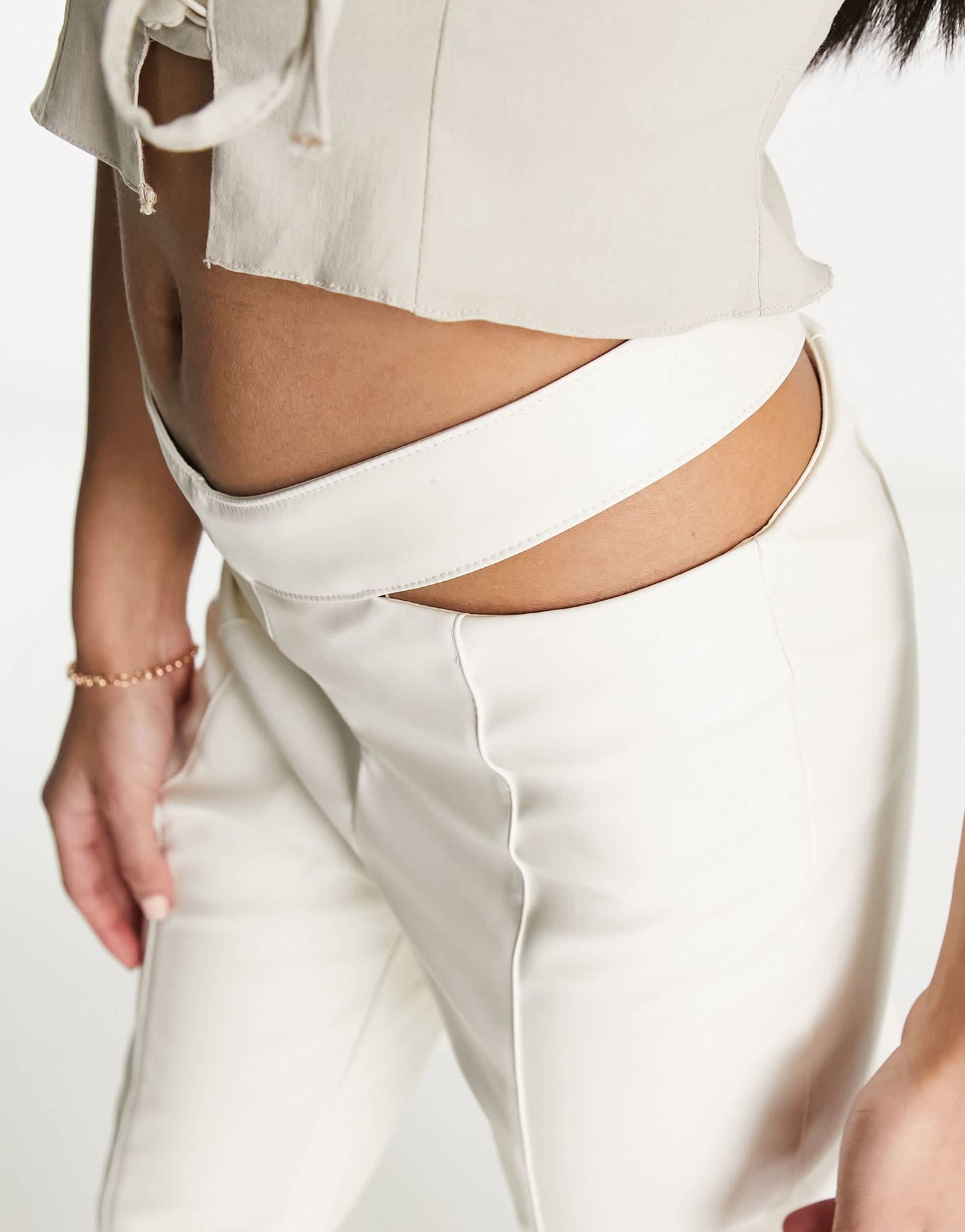 The Couture Club high waisted cut out trousers in cream