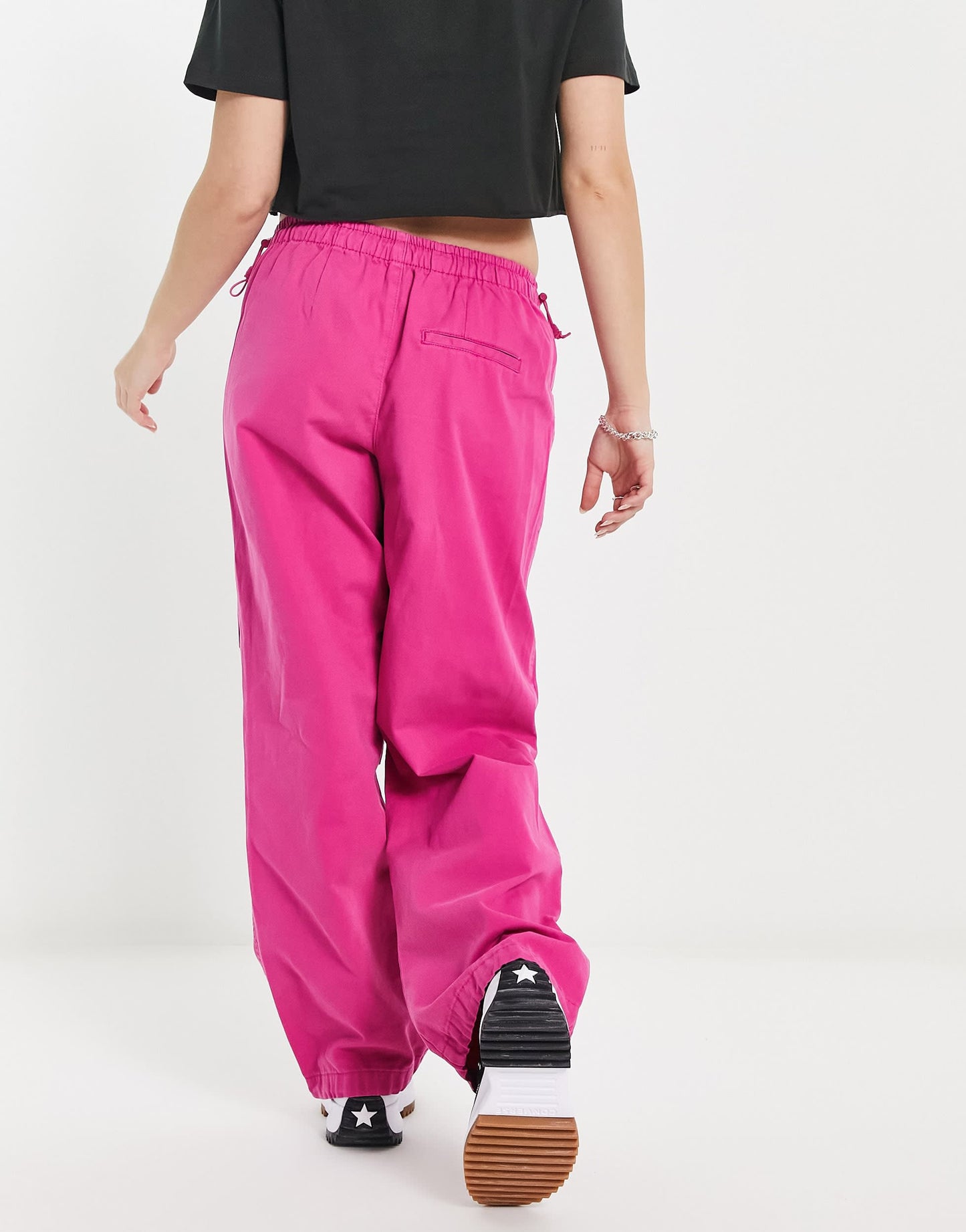 Bershka baggy parachute tech pant in pink