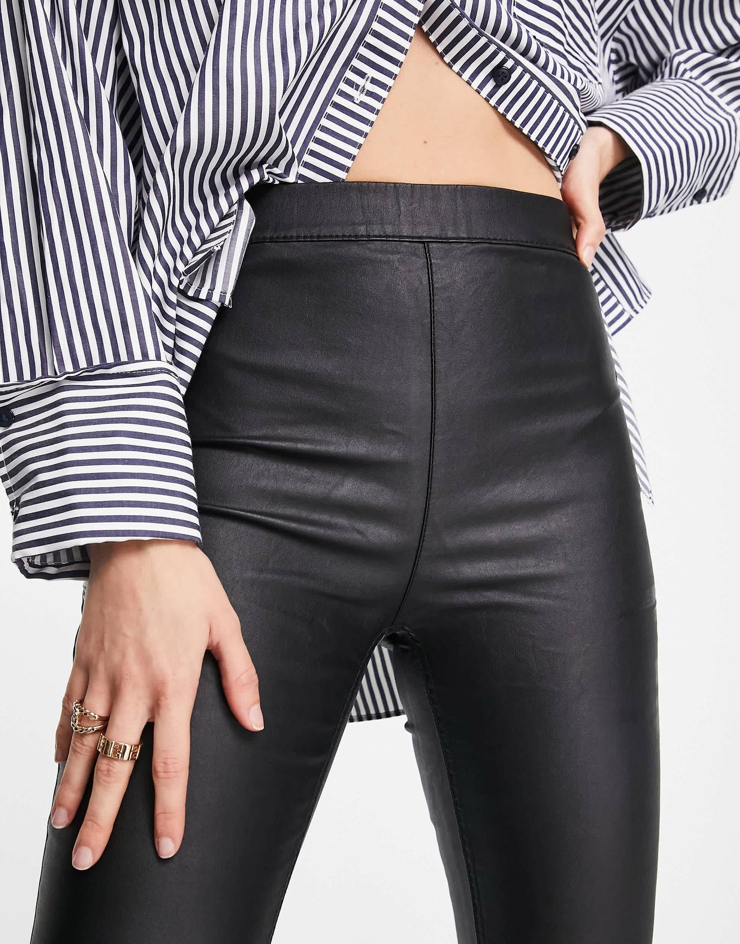 Stradivarius Tall coated flare jean with split hem detail in black