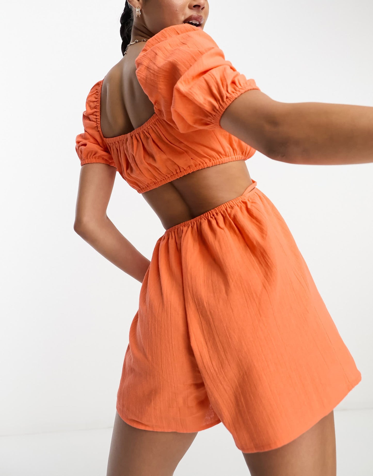 ASOS DESIGN cut out waist beach playsuit in orange
