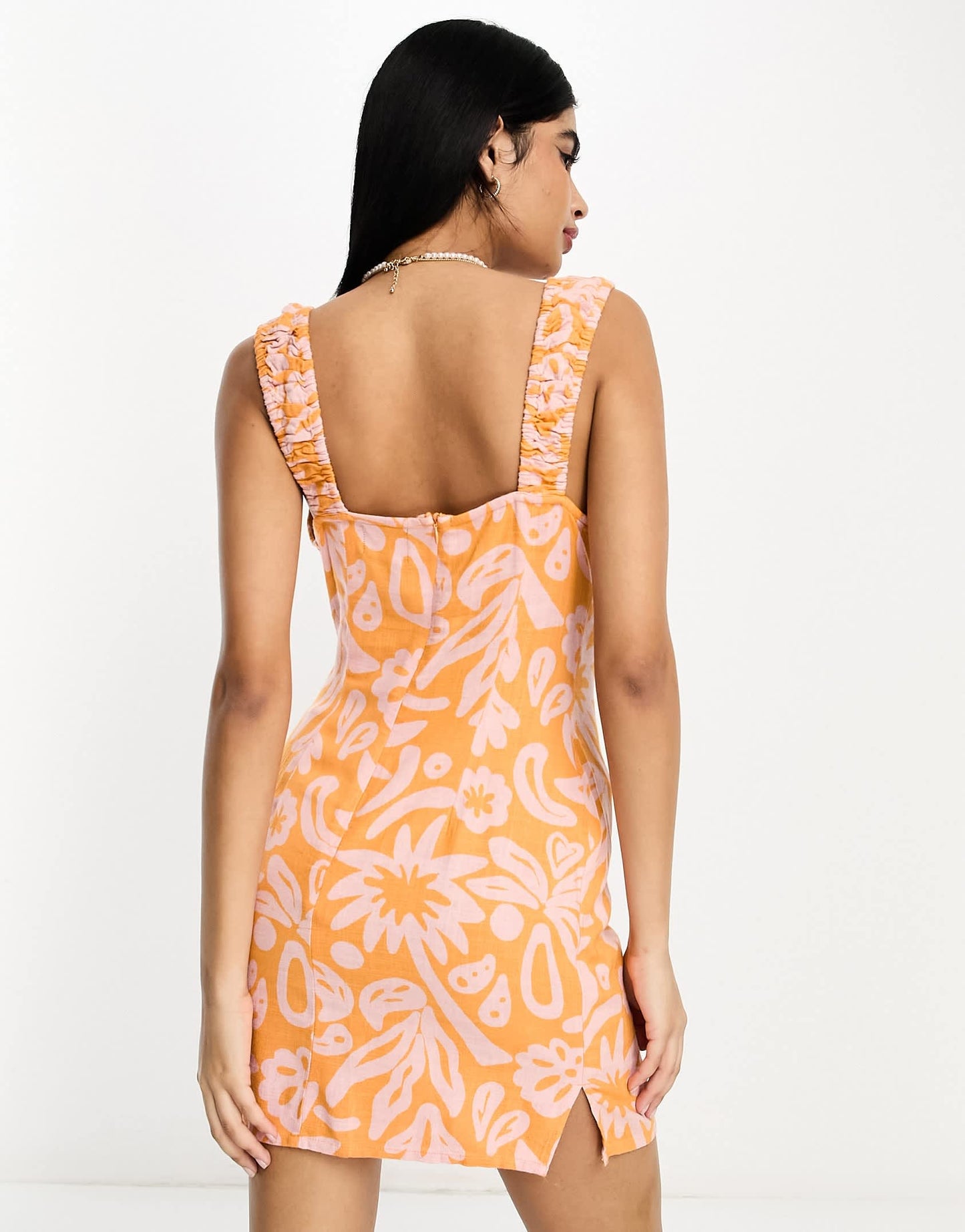 ASOS DESIGN linen mini sundress with ruched bust and cut out detail in tropical abstract print