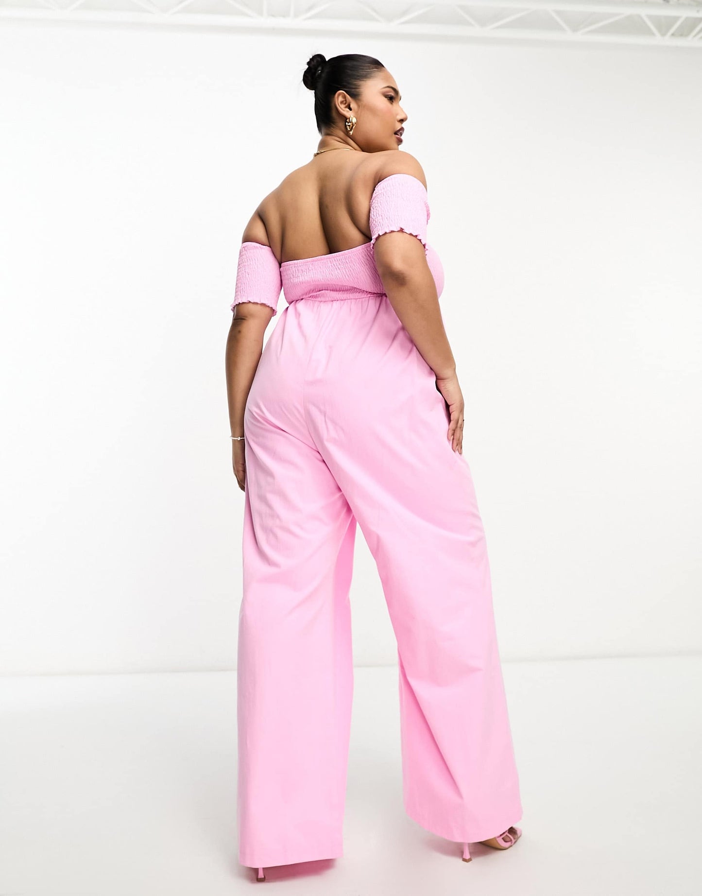 The Frolic Plus shirred off shoulder wide leg jumpsuit in pink
