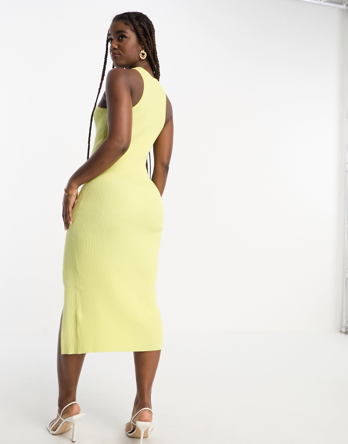 The Frolic exclusive midi dress with twist high neck and side slit in yellow