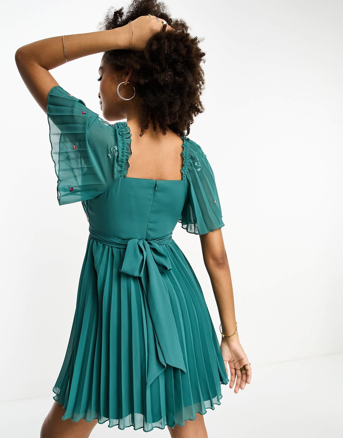 ASOS DESIGN tie back angel sleeve pleated mini dress with embroidered bust in teal