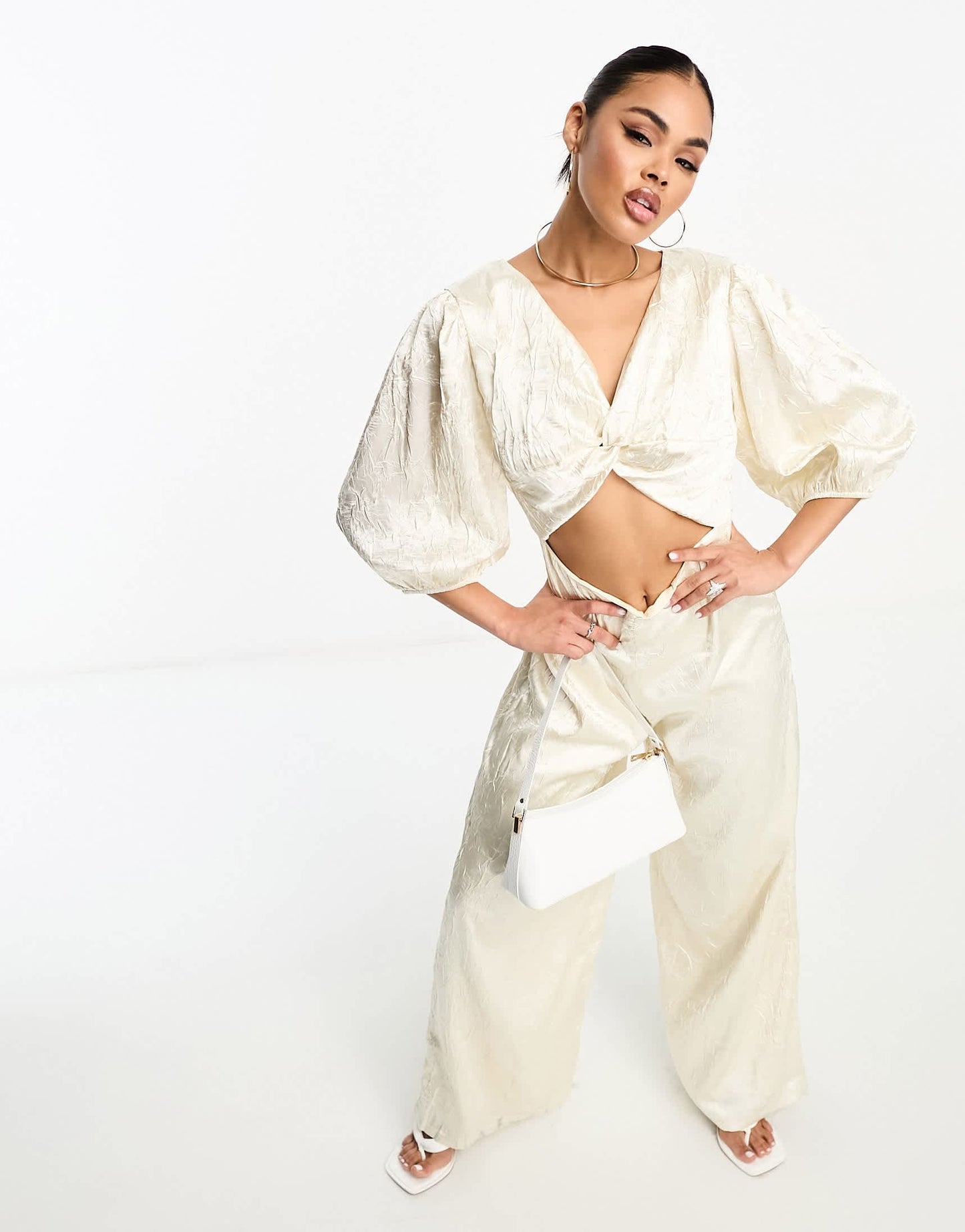 Collective the Label exclusive twisted cut-out jumpsuit in oyster