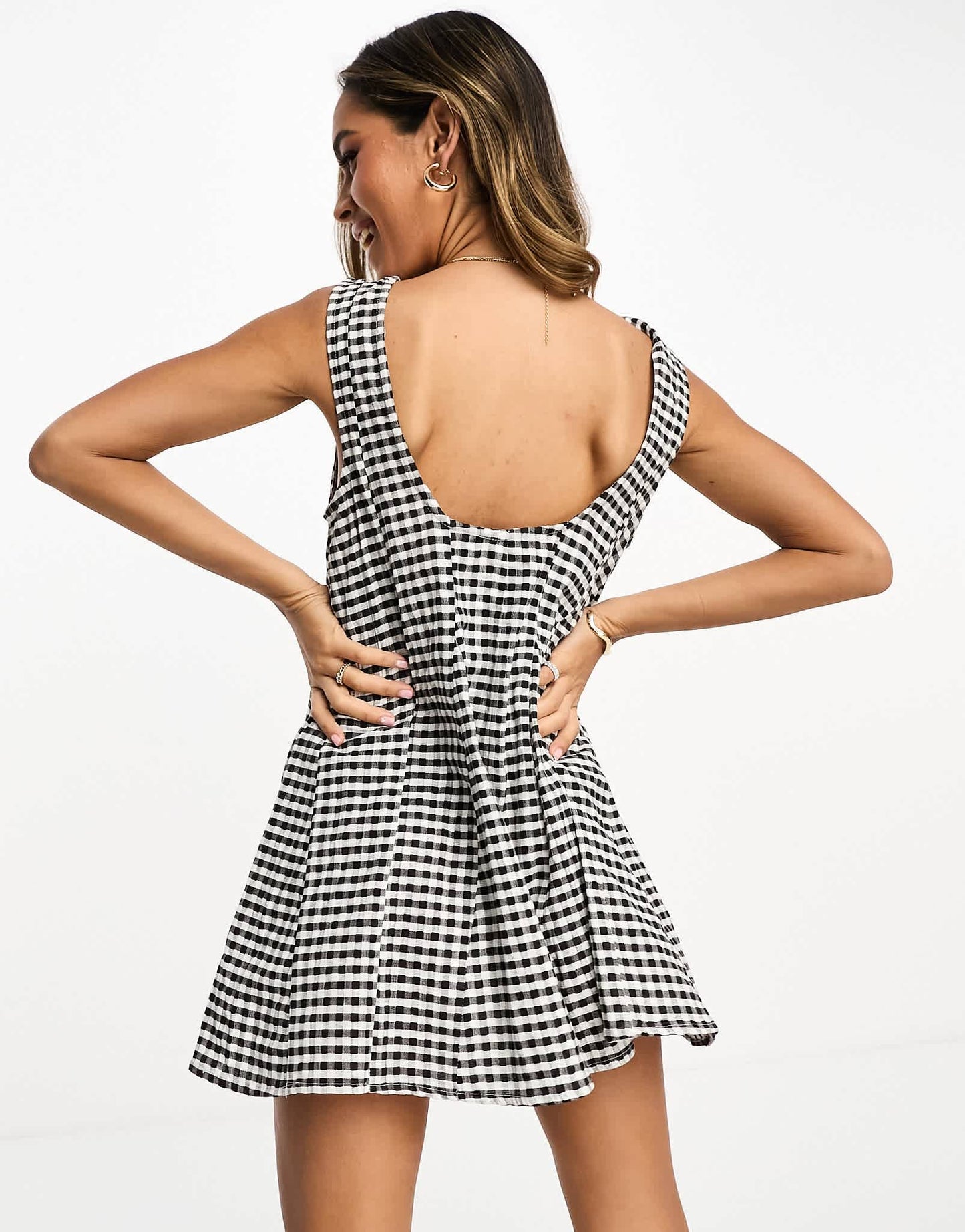ASOS DESIGN textured godet chuck on playsuit in mono gingham