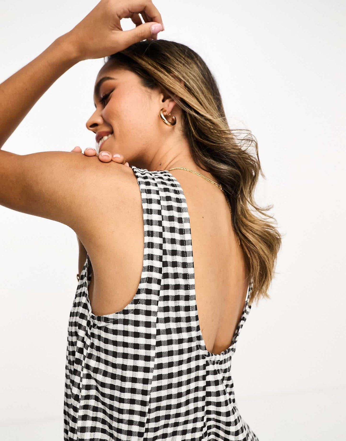 ASOS DESIGN textured godet chuck on playsuit in mono gingham