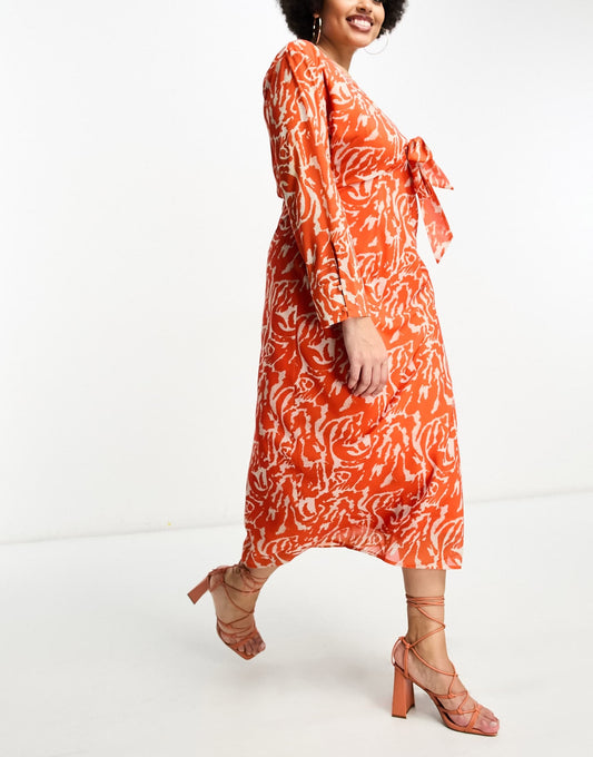 Pretty Lavish Curve long sleeve tie midaxi dress in orange zebra