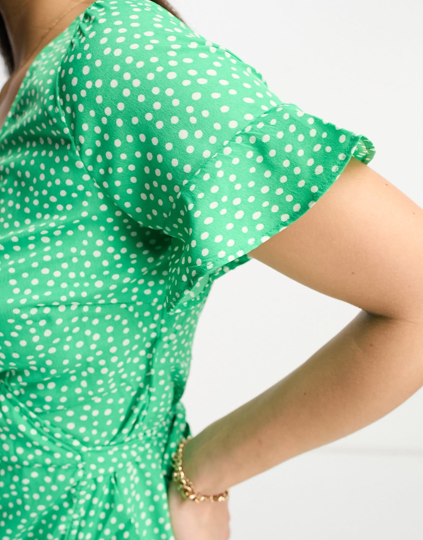 Vero Moda Petite wrap mini dress in bright green spot print