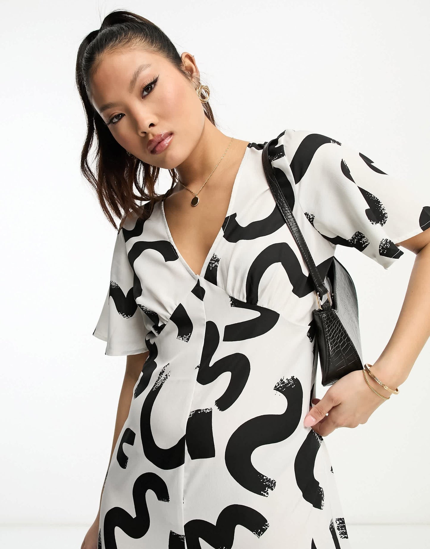Vero Moda Petite wide leg jumpsuit in mono abstract print