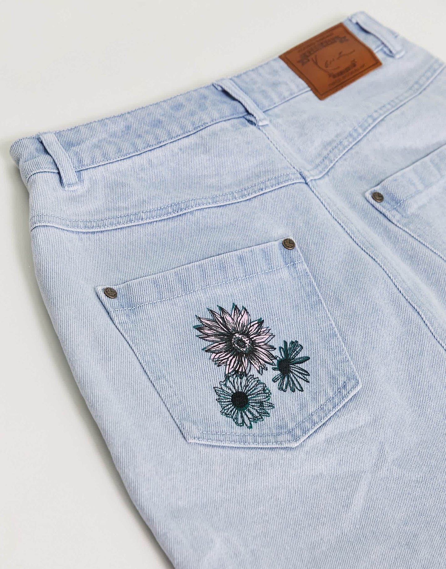 Karl Kani OG denim skirt in light blue with floral embroidery