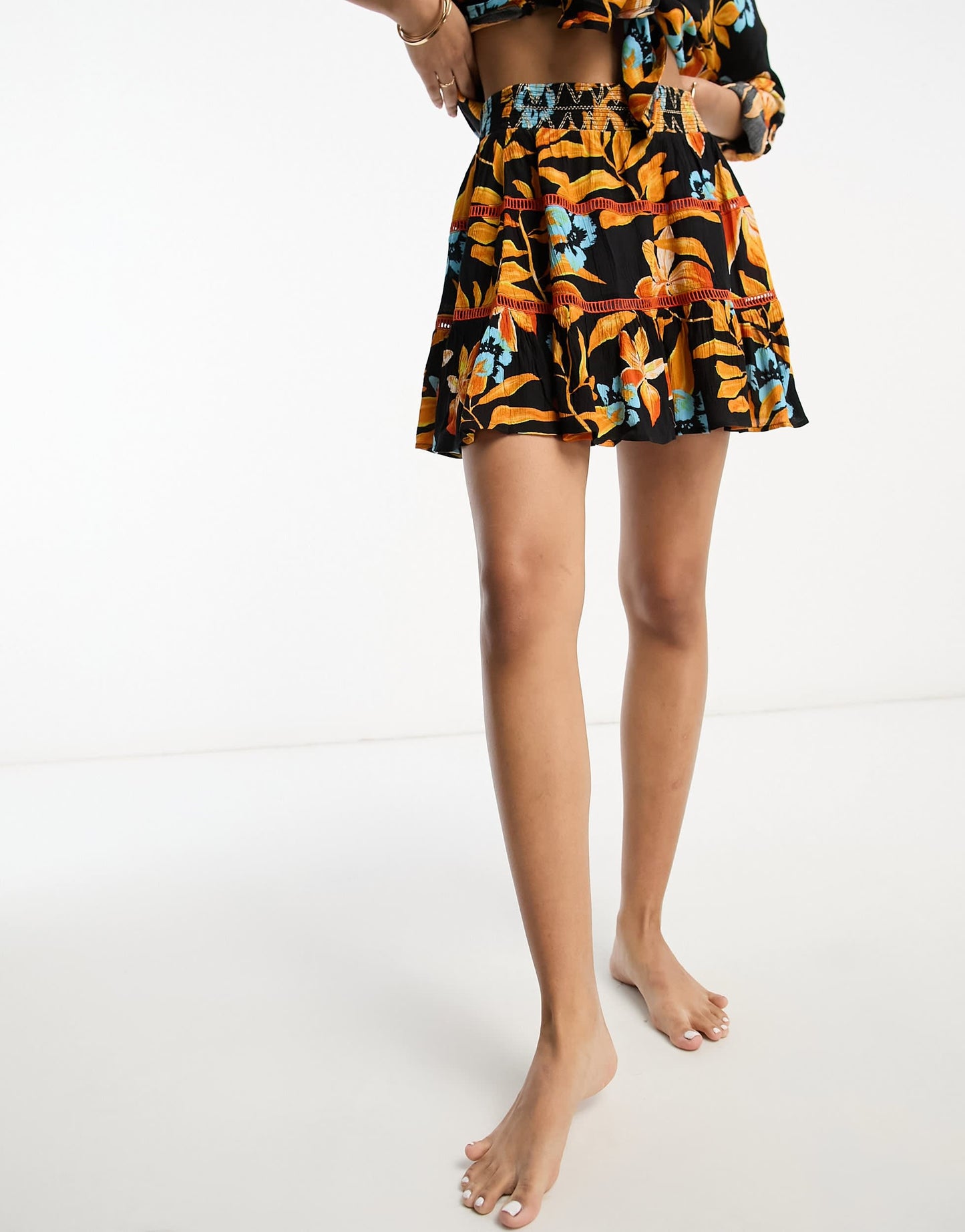River Island shirred mini beach skirt co-ord in black tropical print