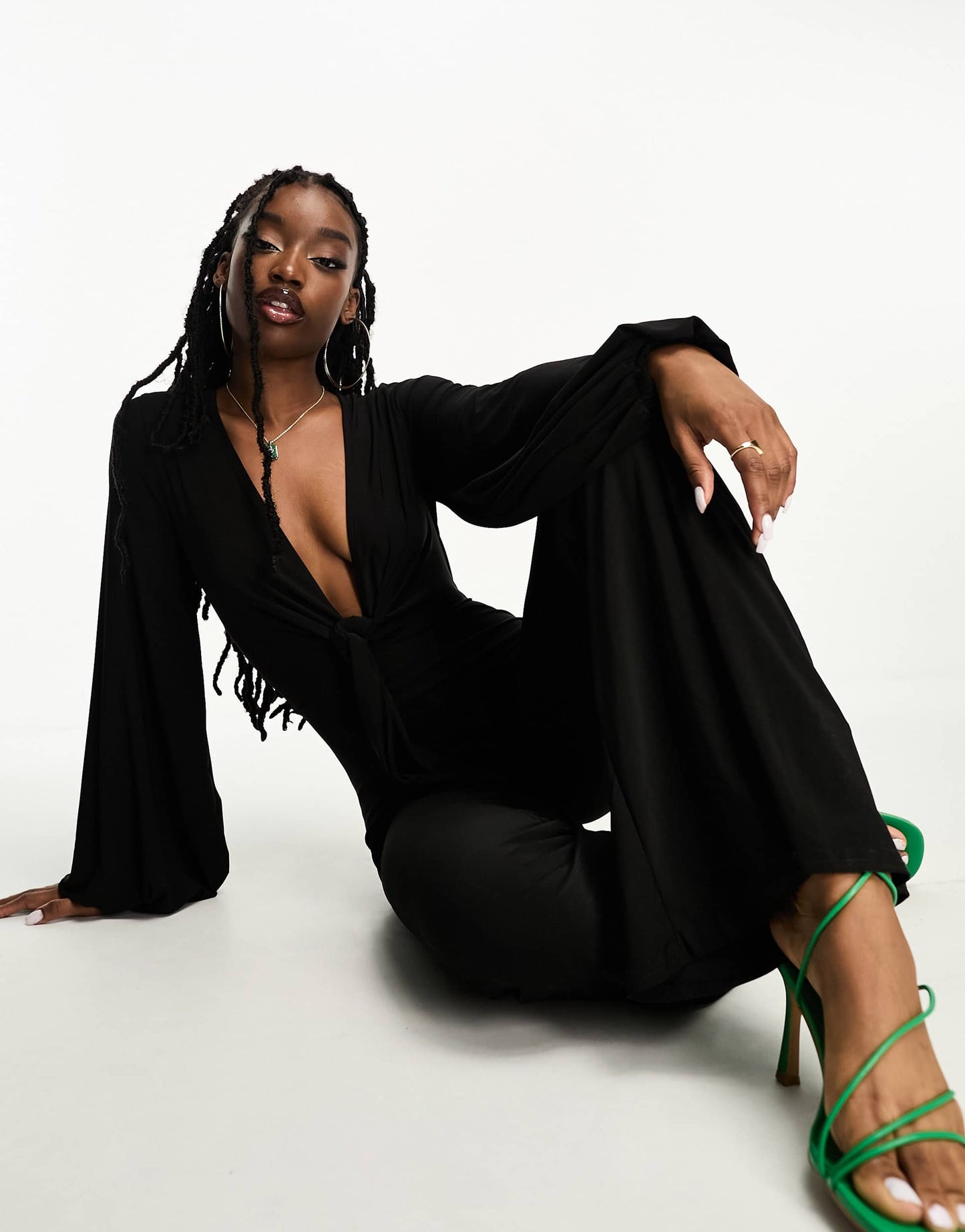 ASOS DESIGN glam plunge tie front jumpsuit in slinky in black