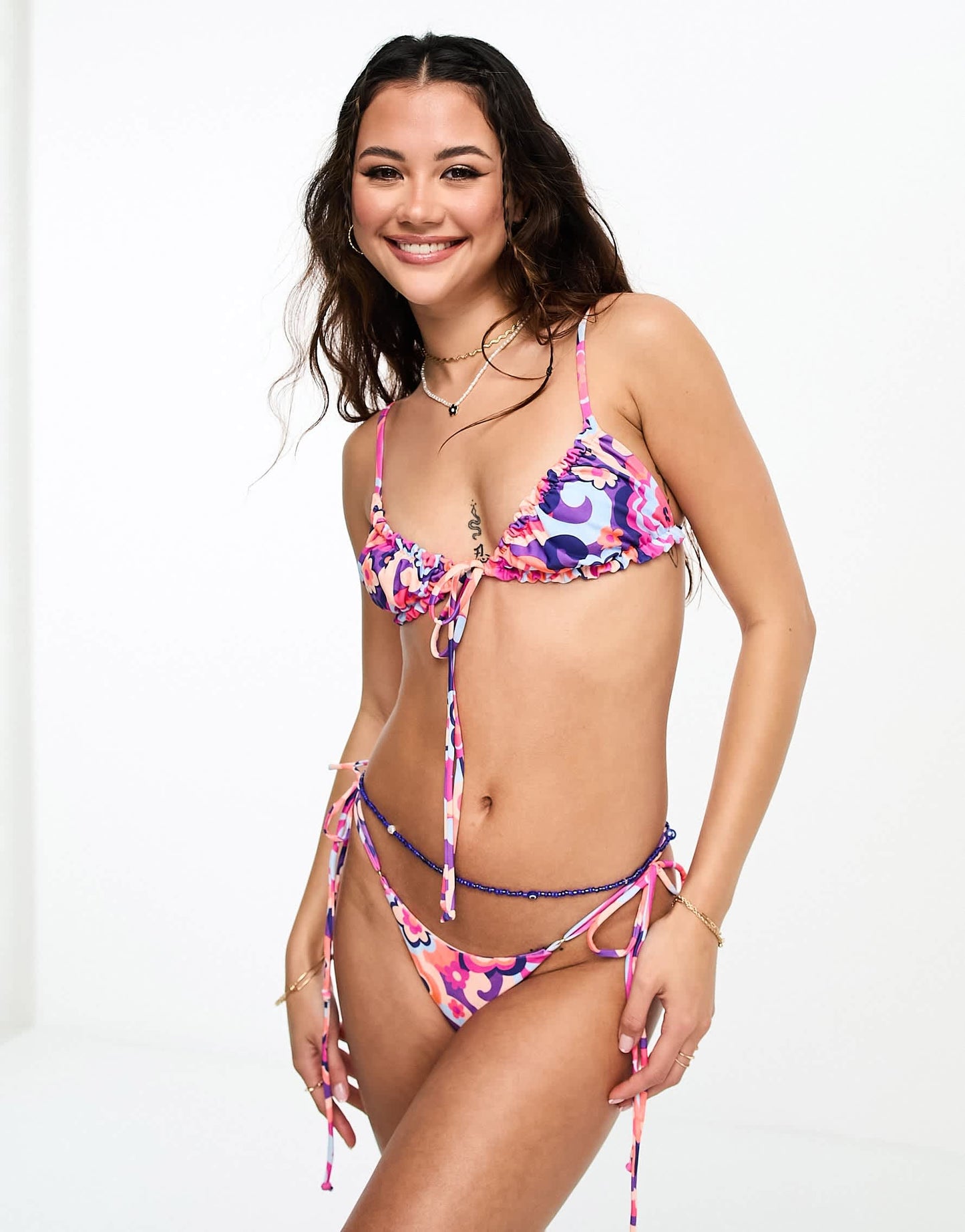 Kulani Kinis Thong tie side bikini bottom in Tipsy Dip floral print