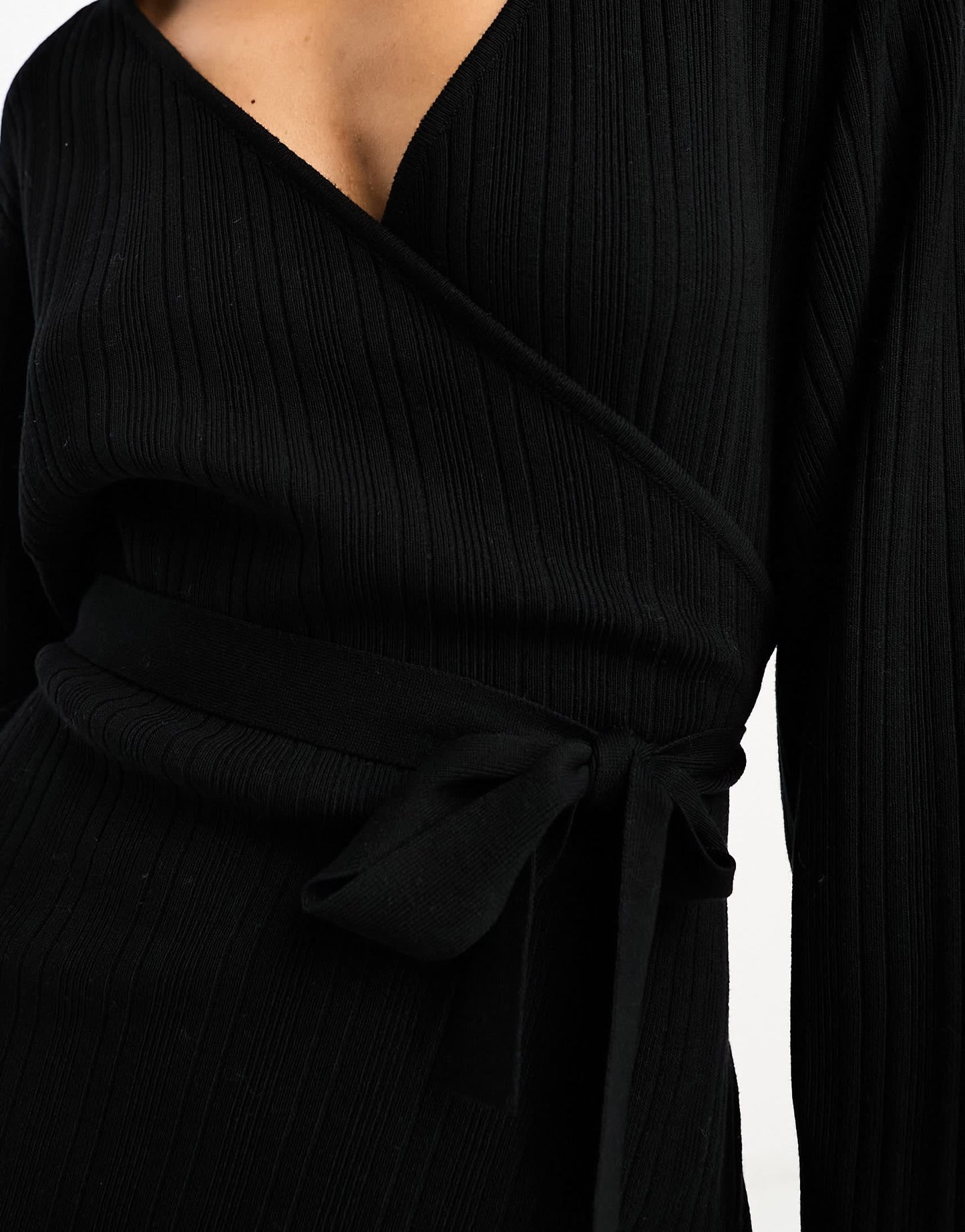 Pretty Lavish knitted wrap mini dress in black