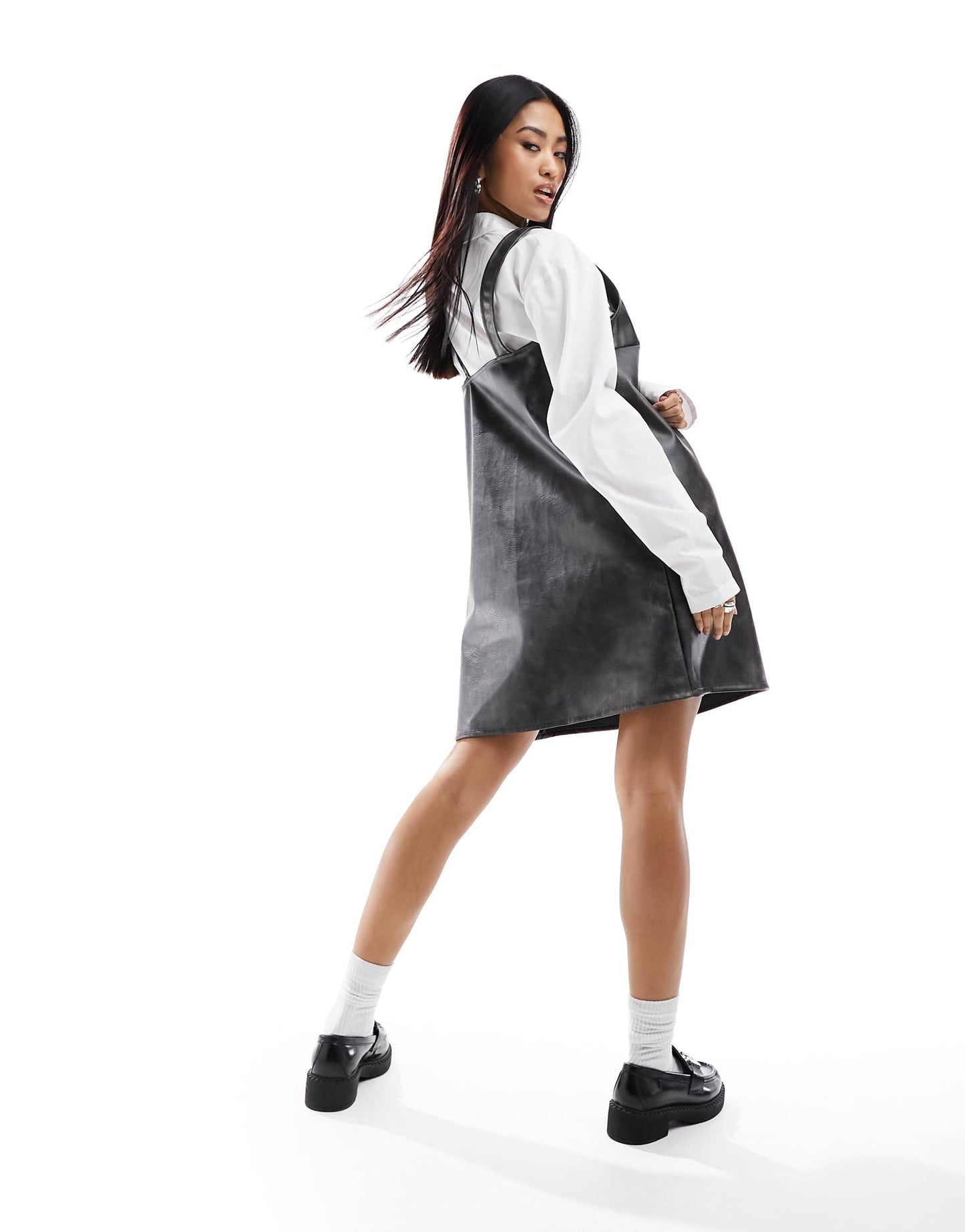 Monki mini pinafore slip dress in distressed black faux leather