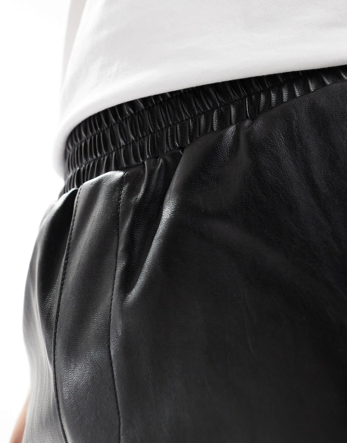 ASOS DESIGN long length faux leather shorts in black
