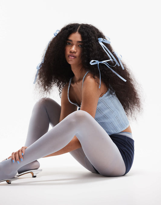 ASOS DESIGN knitted cami top in pointelle stitch with contrast bow detail in blue