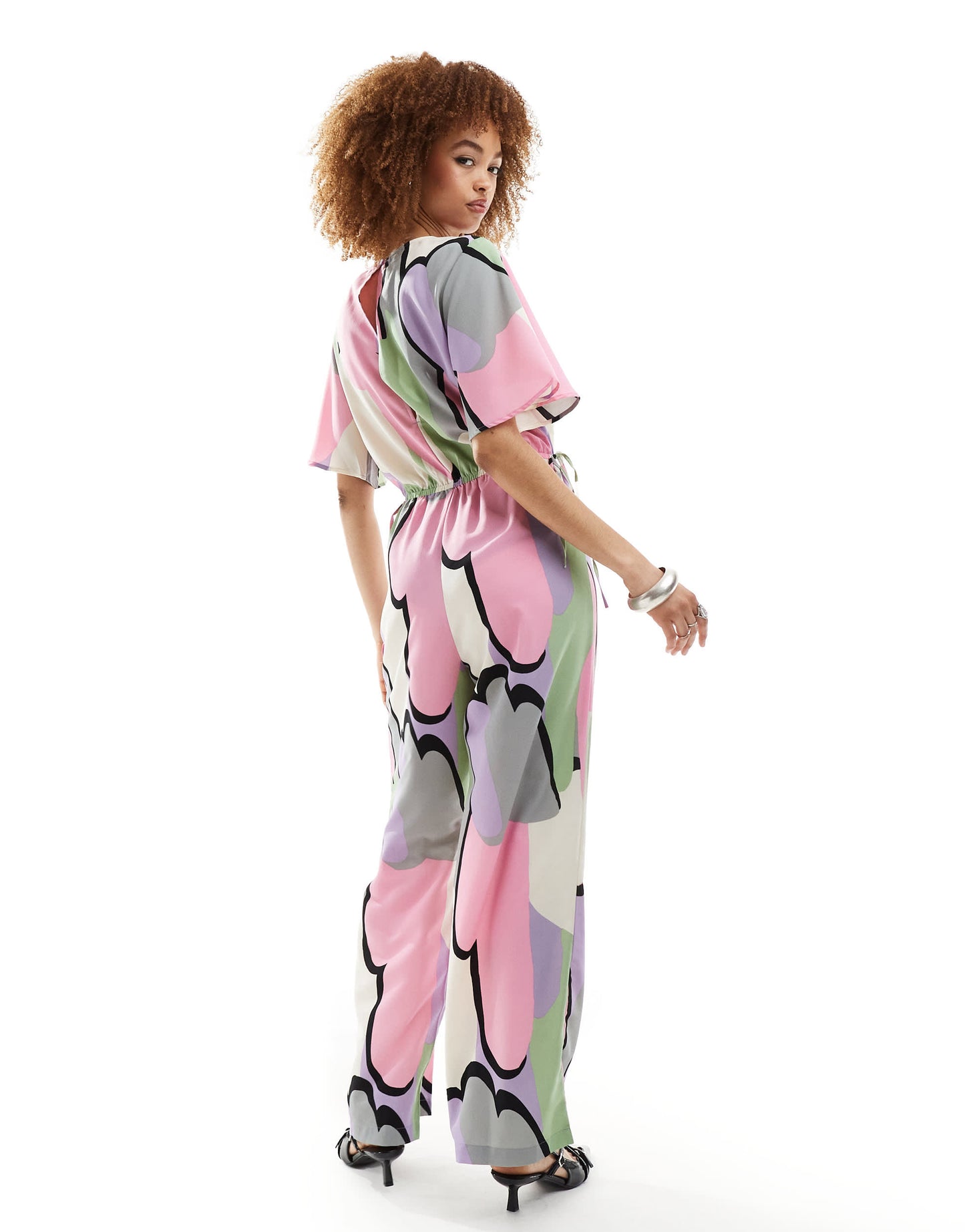 Monki jumpsuit with tie waist detail in multi cloud print