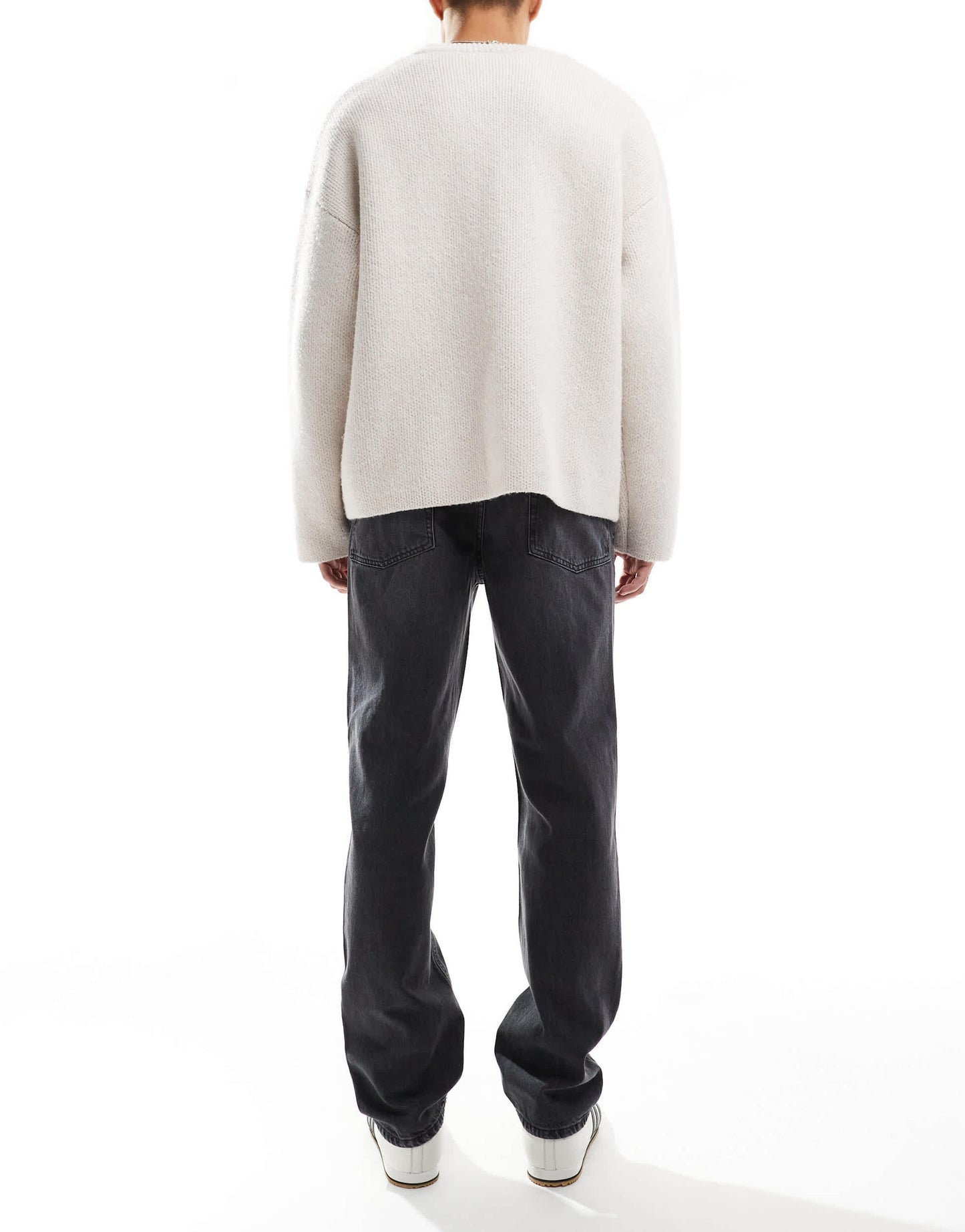 ASOS DESIGN straight leg jeans with rips in washed black